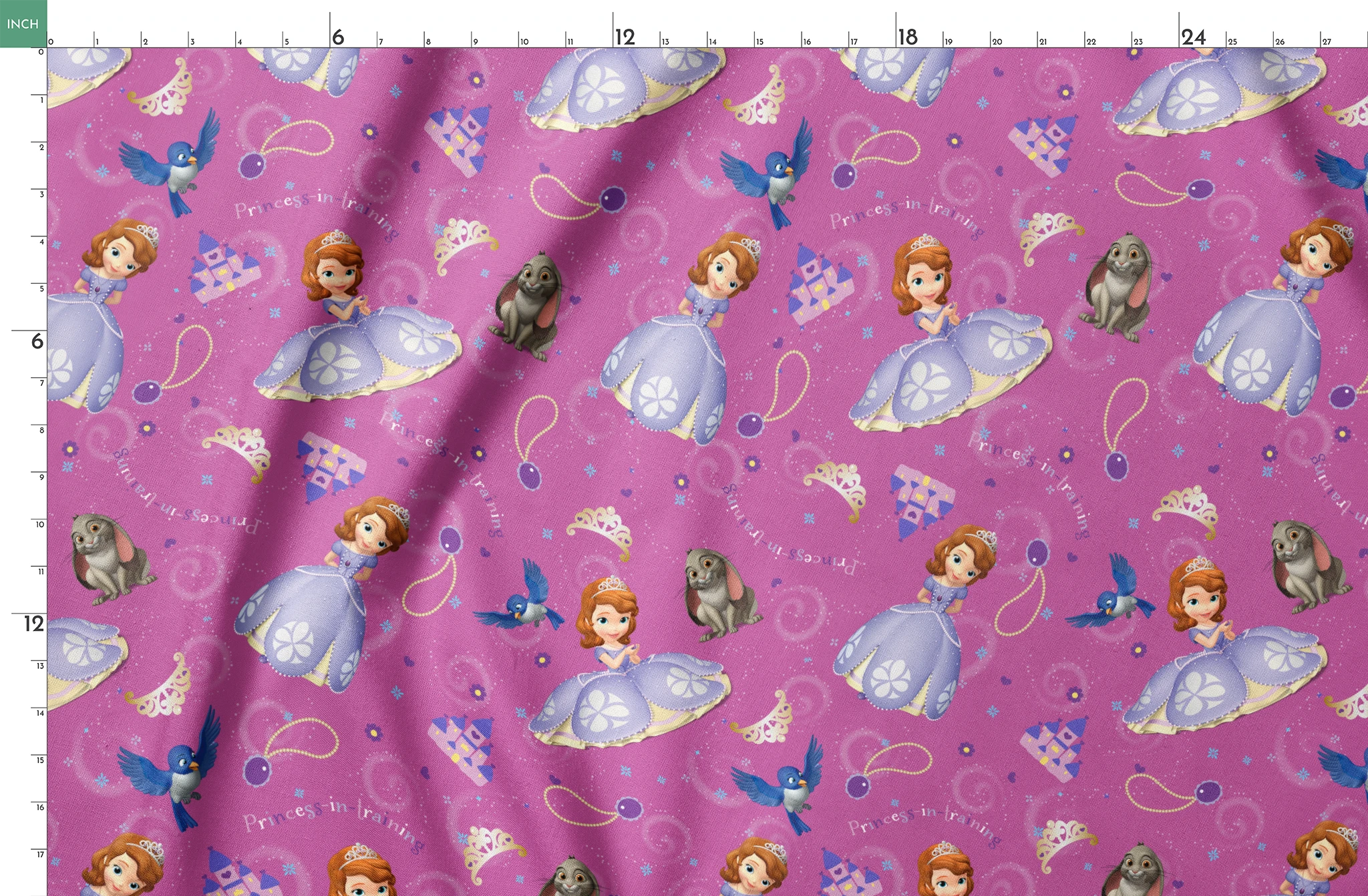 Princess Sofia pattern with purple background, crowns, castles, rabbits, and blue birds scattered among swirling designs springs fatquarter mockup