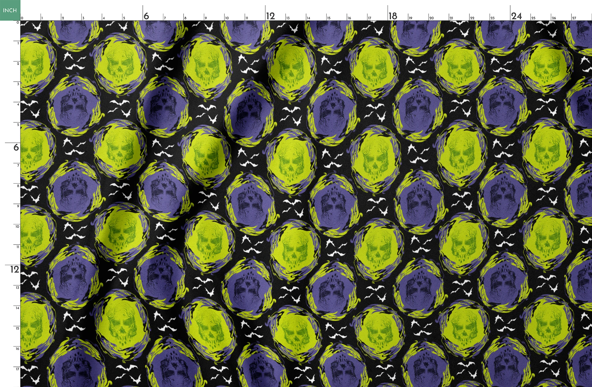 Repeating pattern of neon green and purple skulls with swirling effects on black background with white bats springs fatquarter mockup