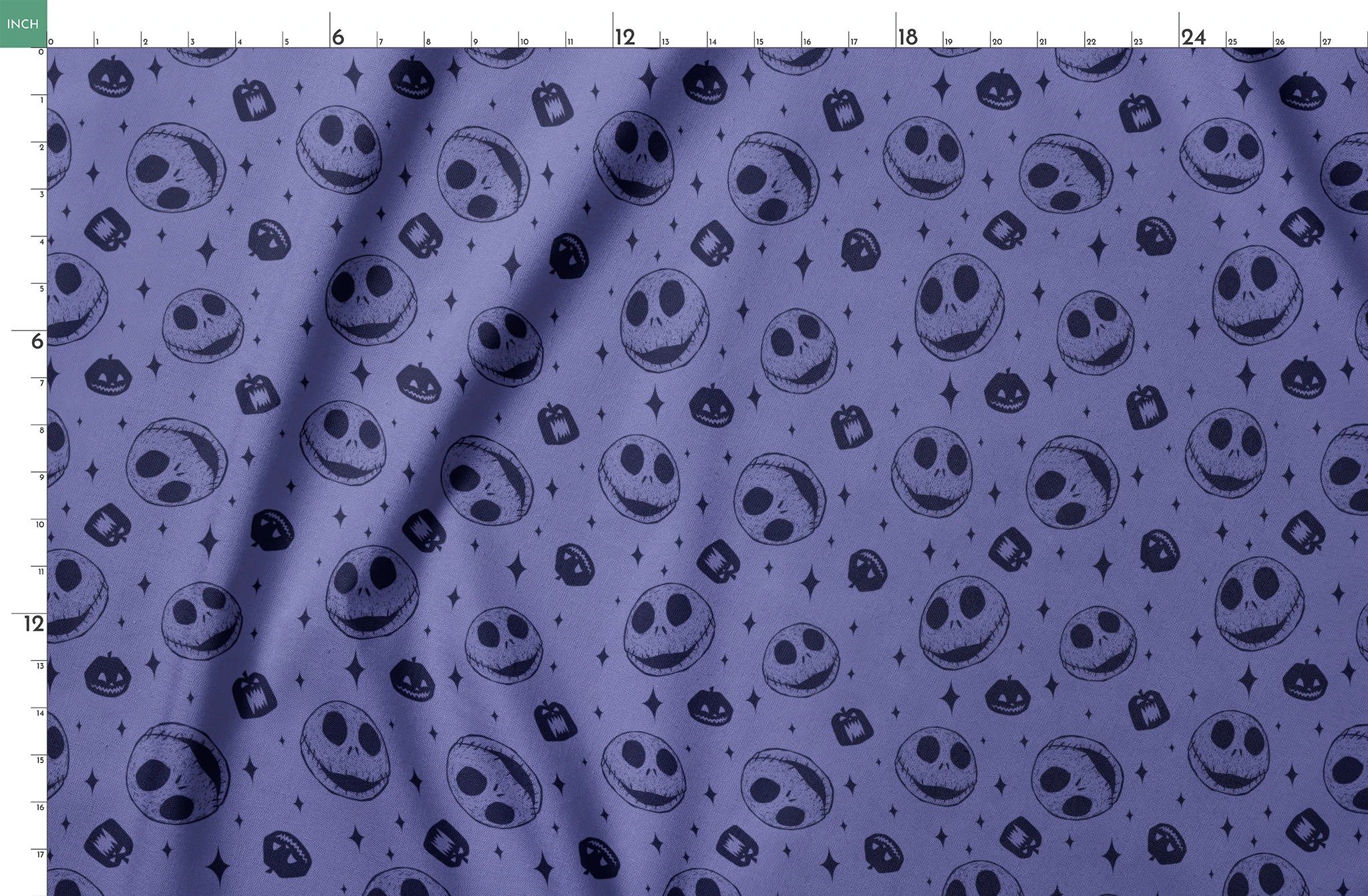 Nightmare Before Christmas skull and pumpkin pattern on purple background with black star shapes springs fatquarter mockup