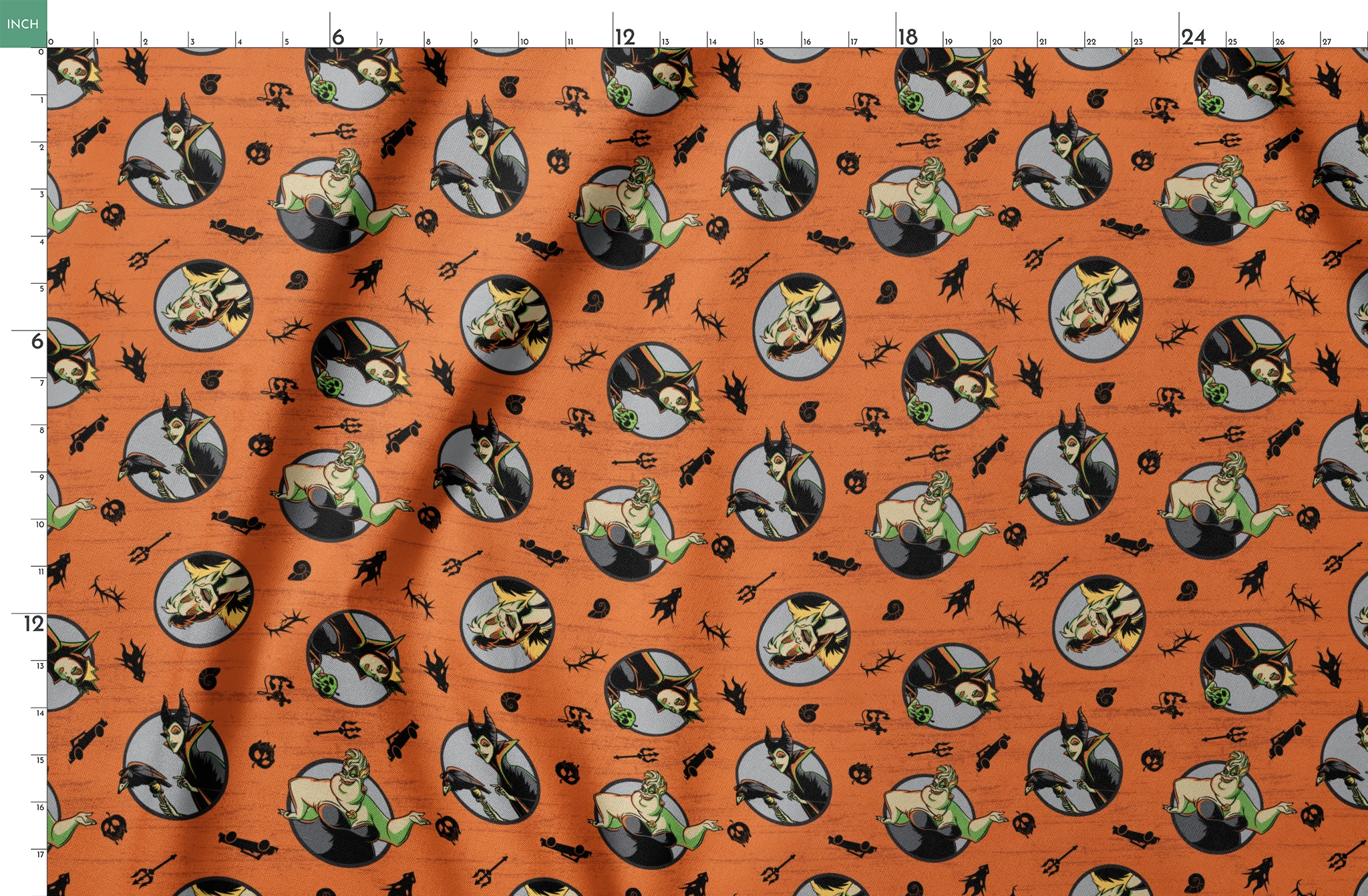 Halloween-themed orange pattern with circular Disney Villain portraits, black cats, bats, pumpkins, and spooky symbols springs fatquarter mockup