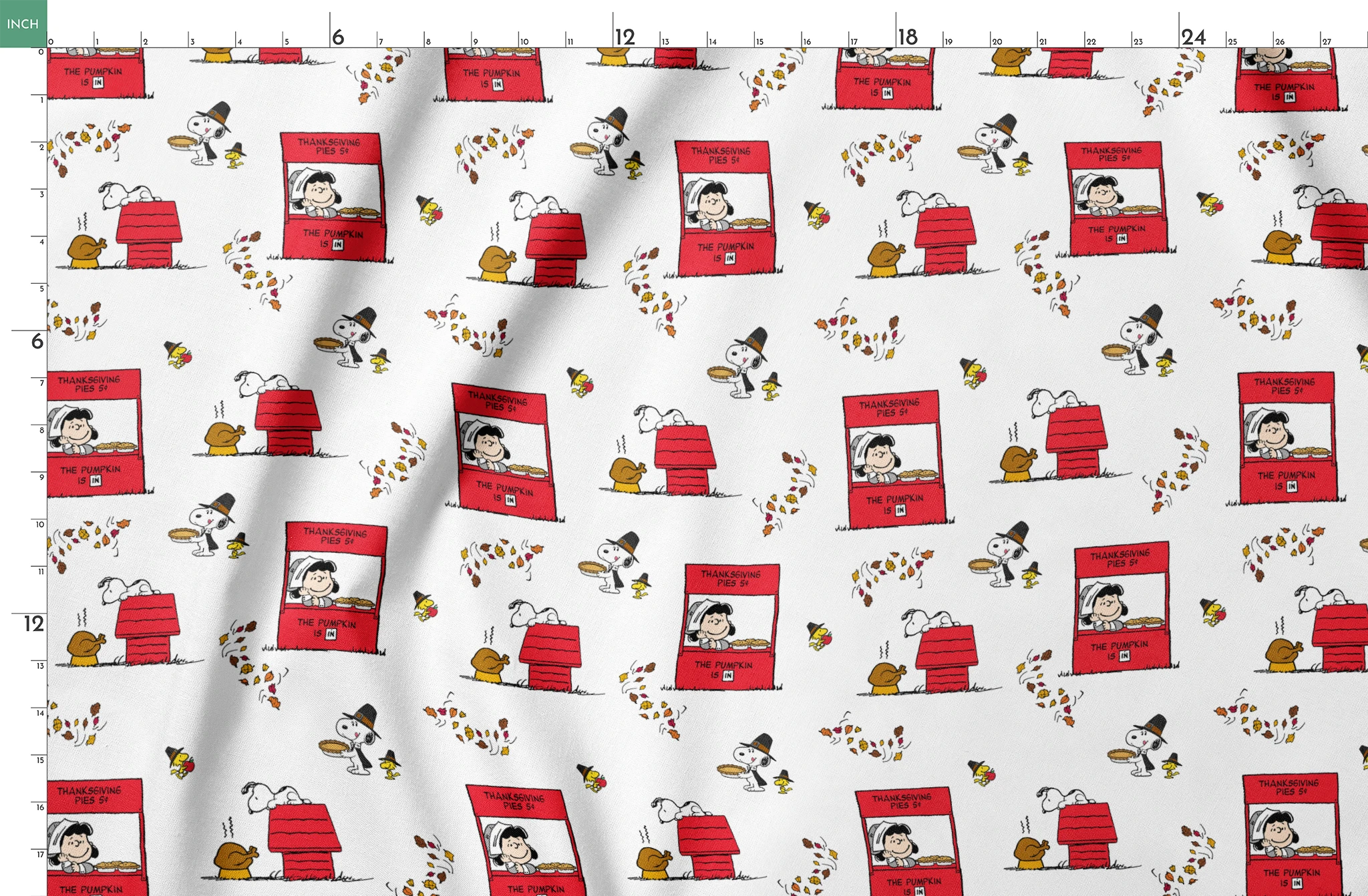 Peanuts Thanksgiving pattern with Snoopy, red booths, doghouses, and falling autumn leaves on white background springs fatquarter mockup