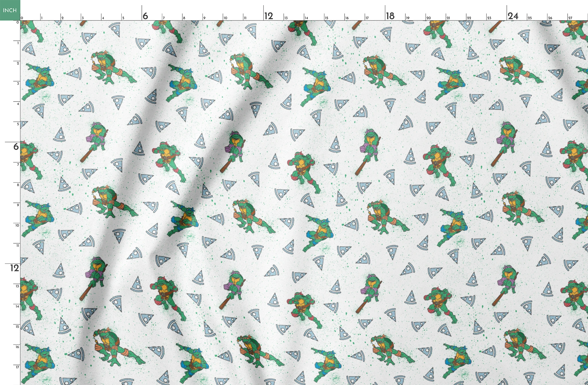 Teenage Mutant Ninja Turtles in action poses scattered among pizza slices on white speckled background springs fatquarter mockup