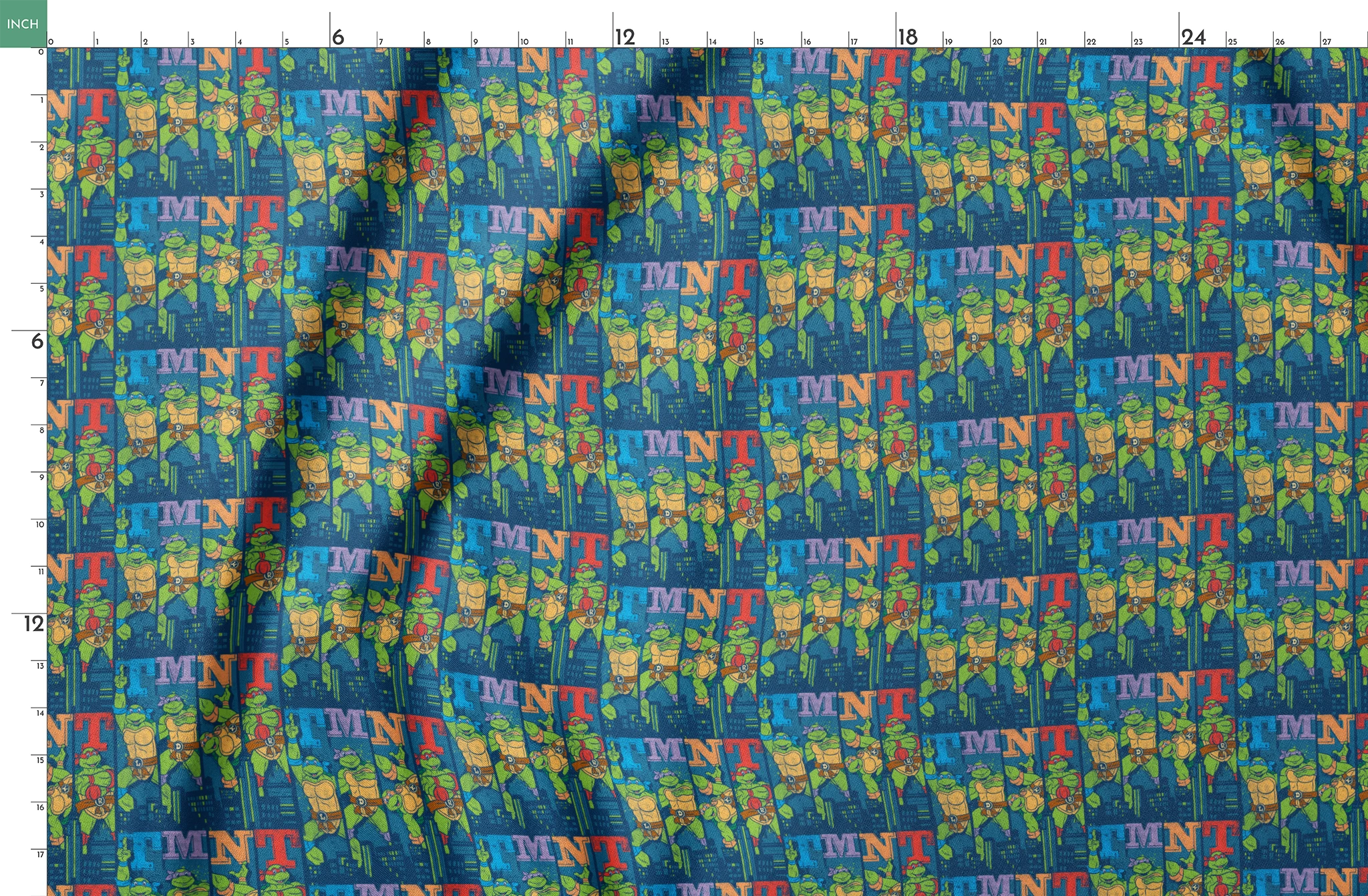 Colorful Teenage Mutant Ninja Turtles cartoon pattern with characters and "TMNT" text on blue cityscape background springs fatquarter mockup