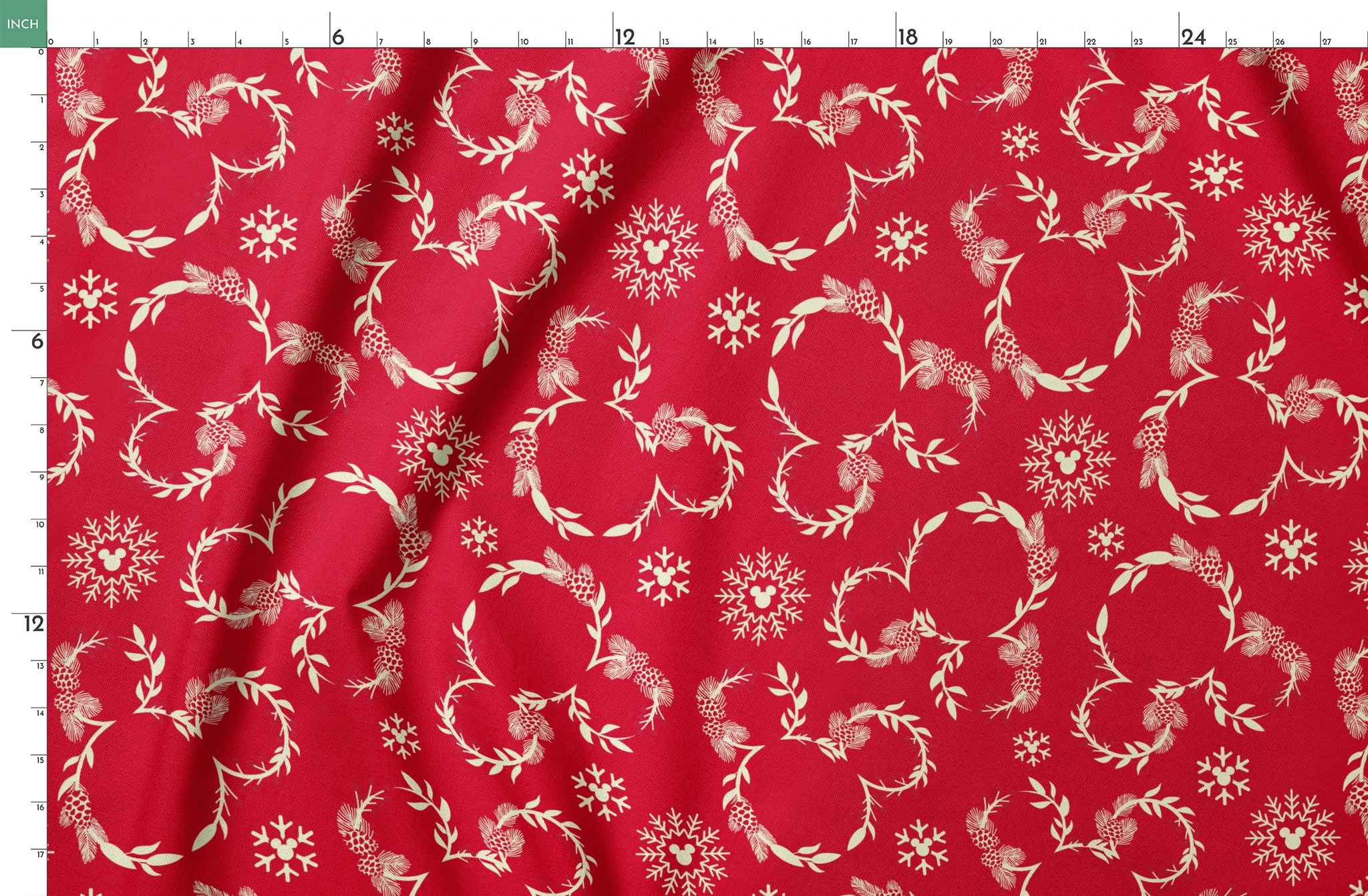 Festive red background with white floral wreaths, pine cones, and snowflake patterns springs fatquarter mockup