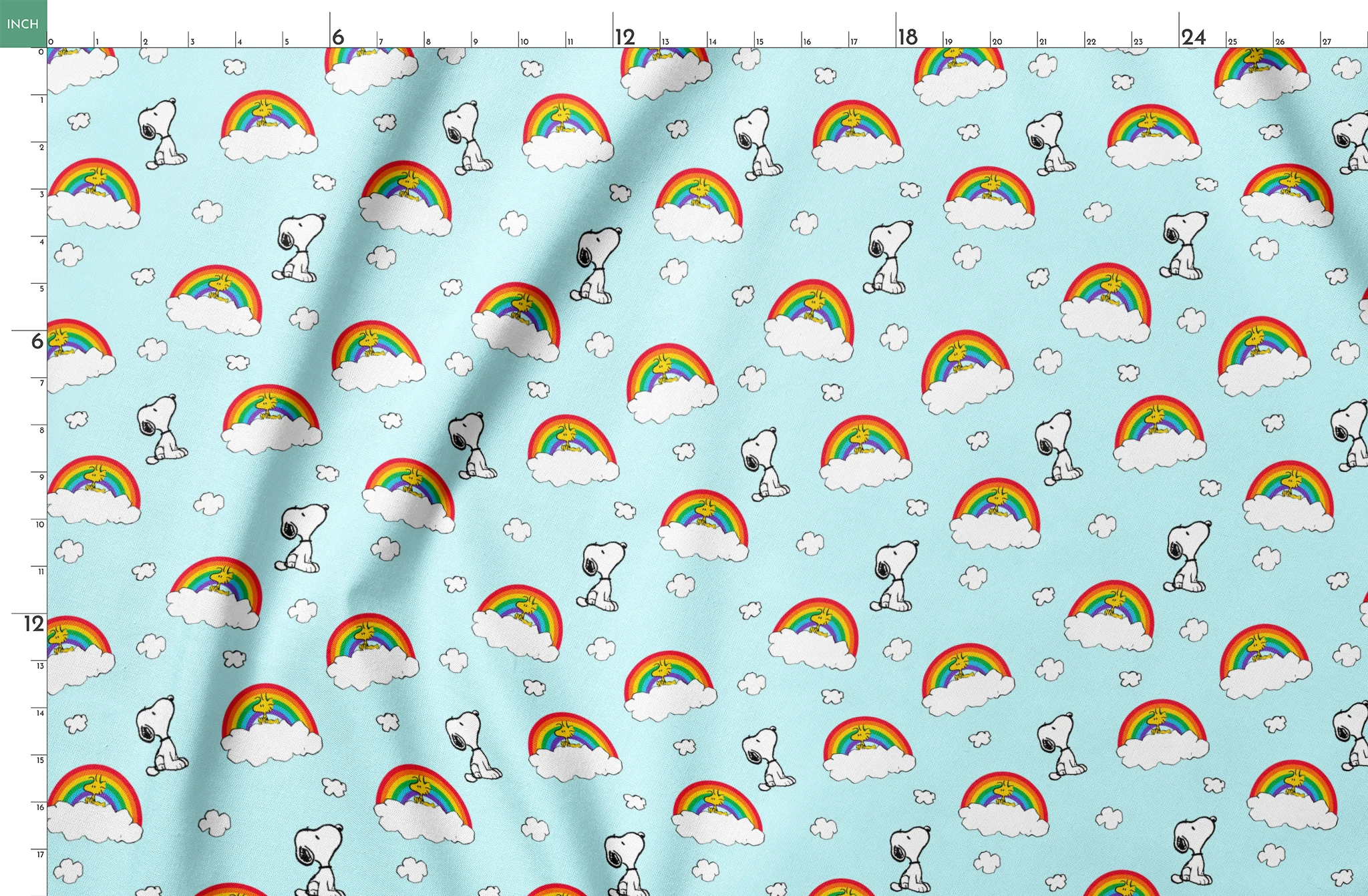 Snoopy and Woodstock characters on light blue background with rainbows, clouds and white fluffy clouds springs fatquarter mockup