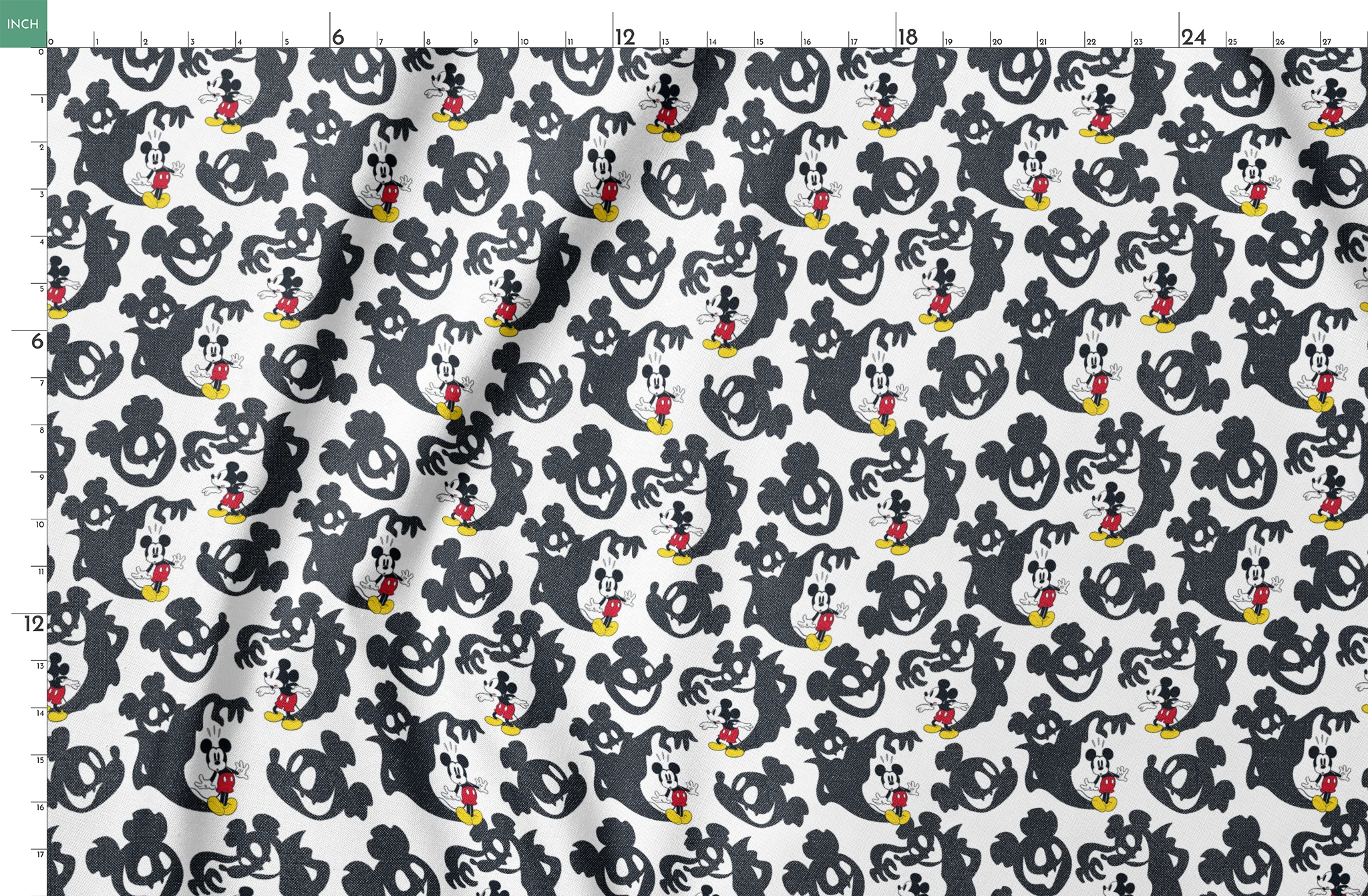 Mickey Mouse pattern with black ghost silhouettes on white background springs fatquarter mockup