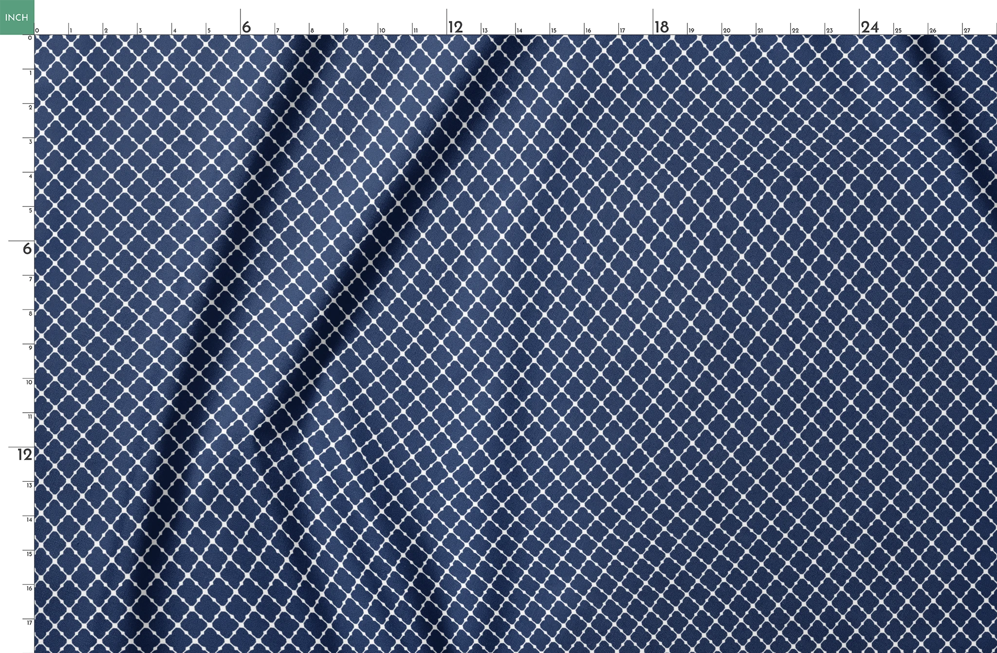 Navy blue quatrefoil pattern with white lattice design on dark background springs fatquarter mockup