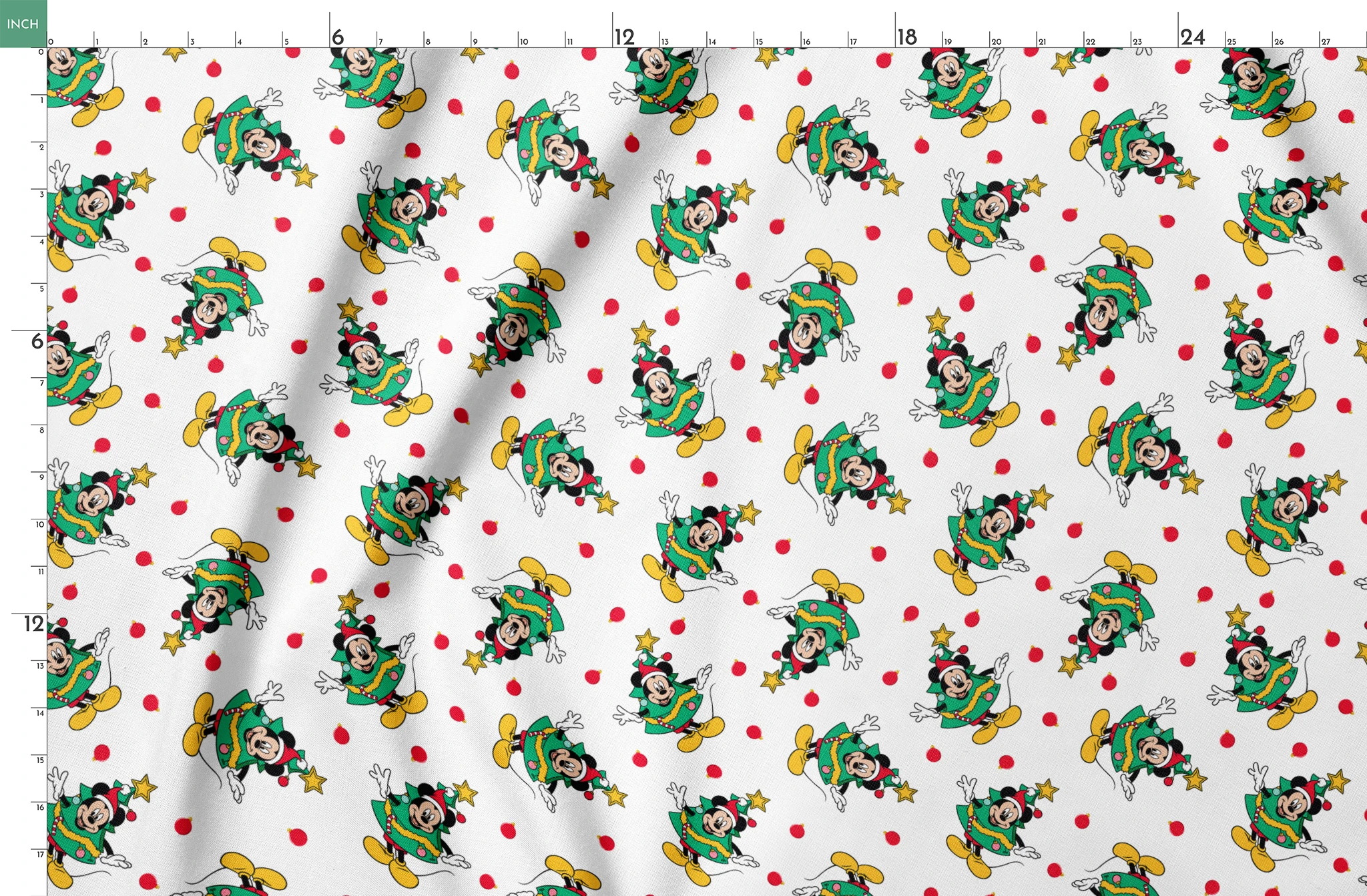 Mickey Mouse in a Christmas tree costume and stars on white background with red dots springs fatquarter mockup