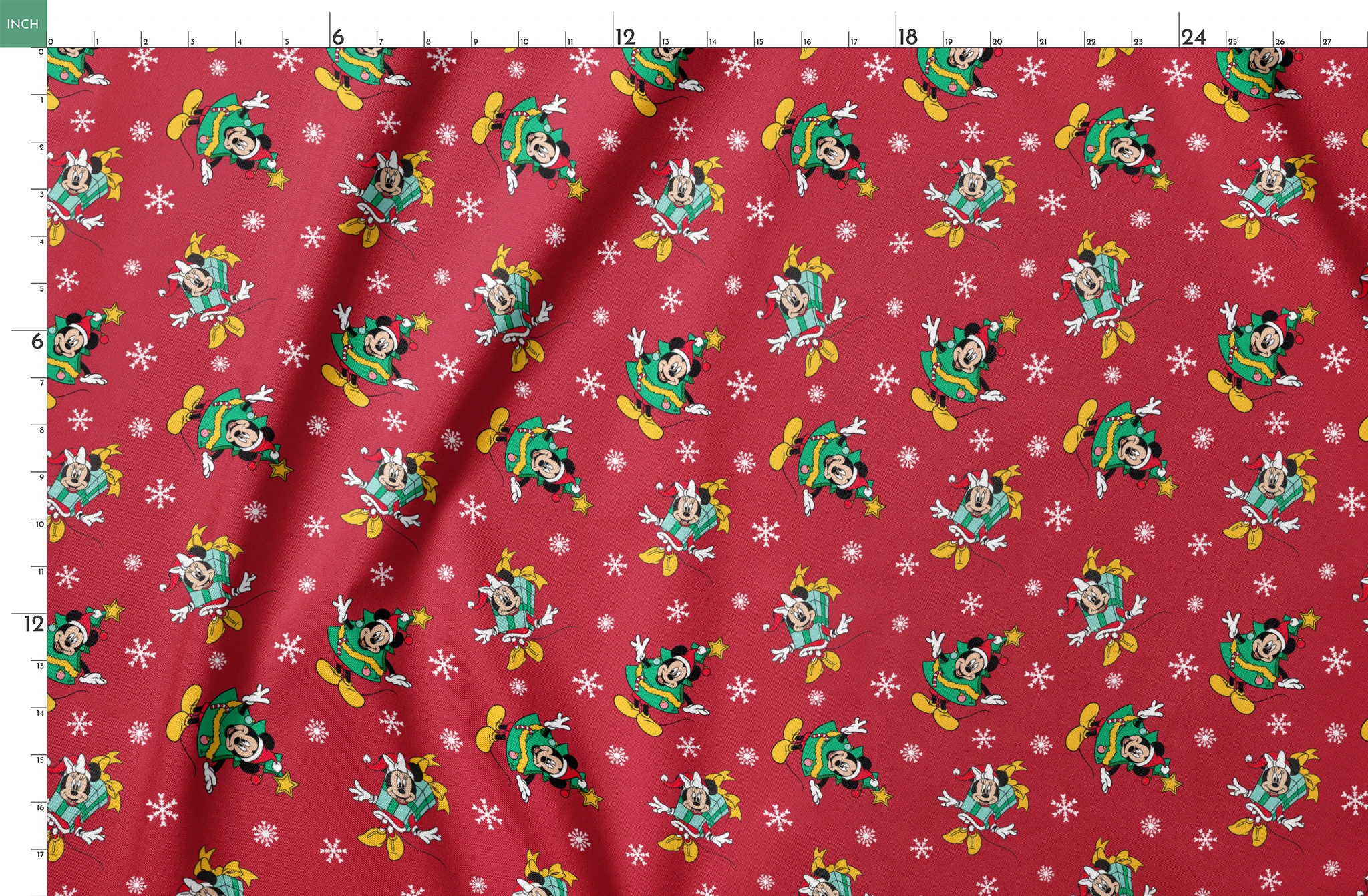 Disney characters in holiday outfits on red background with white snowflakes springs fatquarter mockup