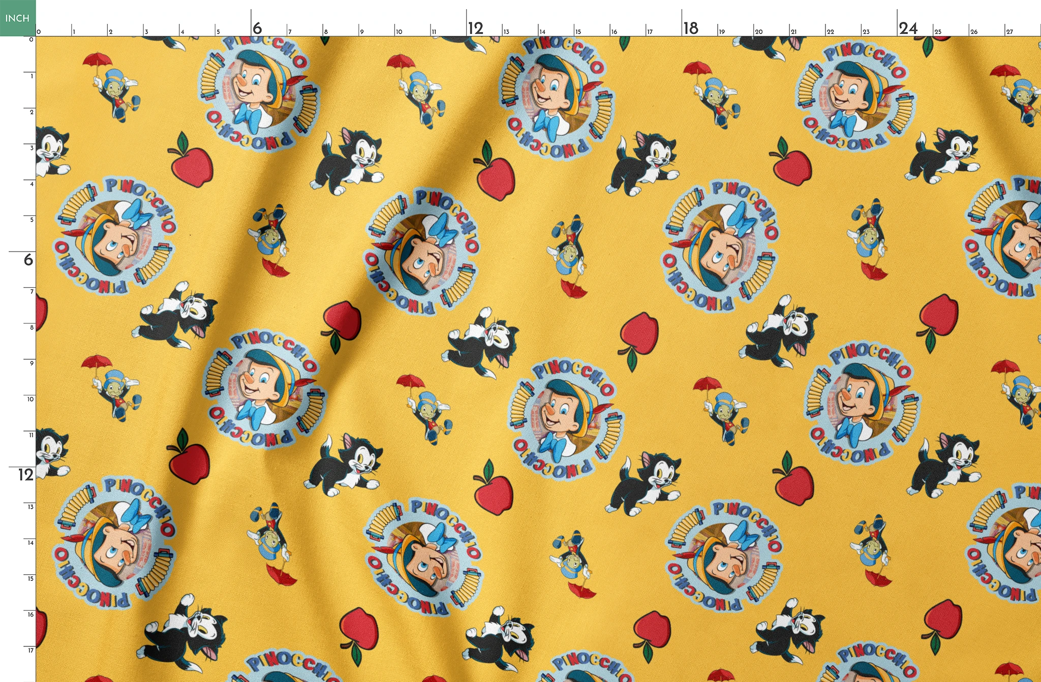 Pinocchio and Disney character pattern on yellow background with circular logos and red apples springs fatquarter mockup