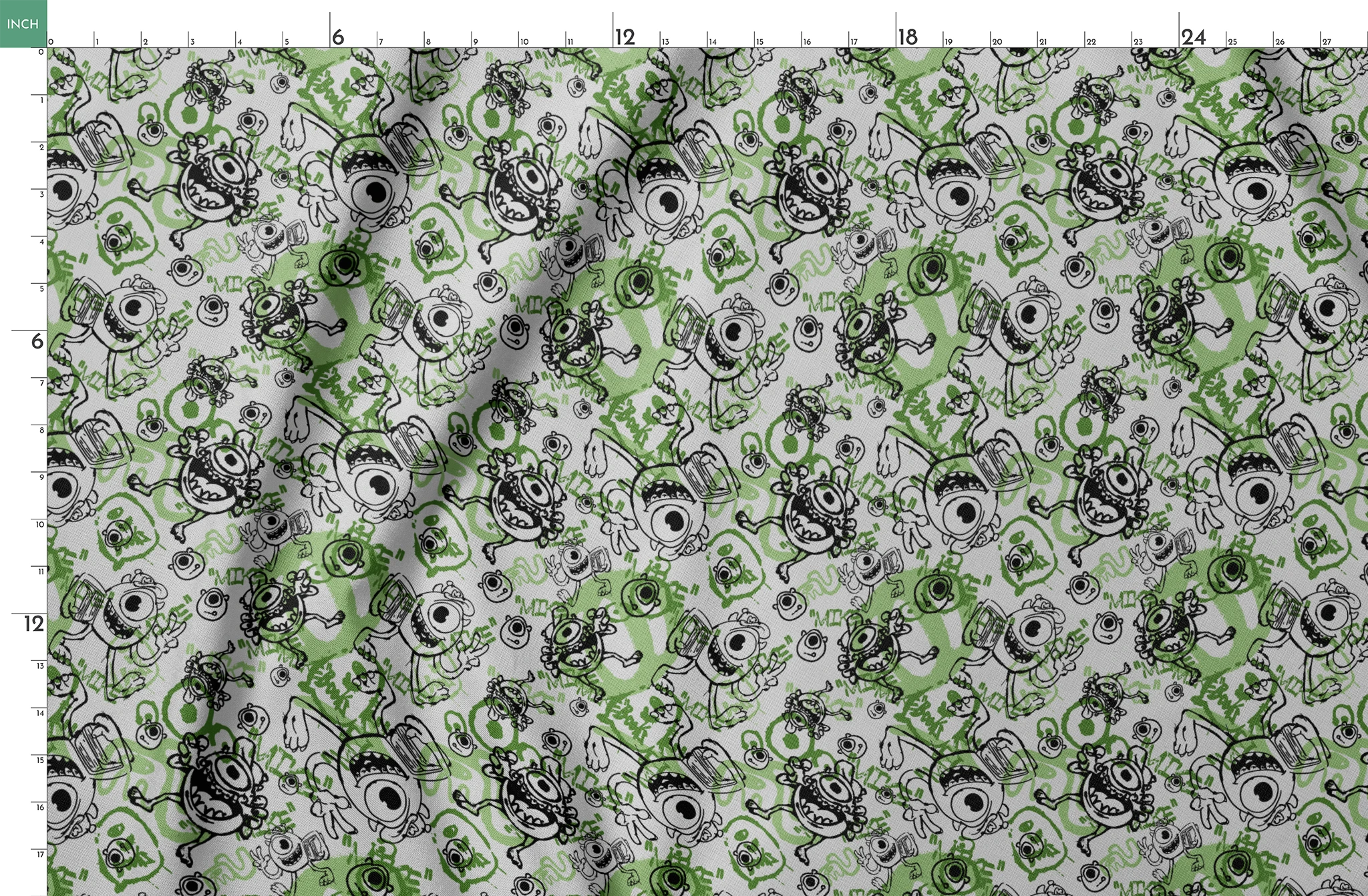 Cartoon monsters doodle pattern in black and green on white background with large eyes and silly expressions springs fatquarter mockup