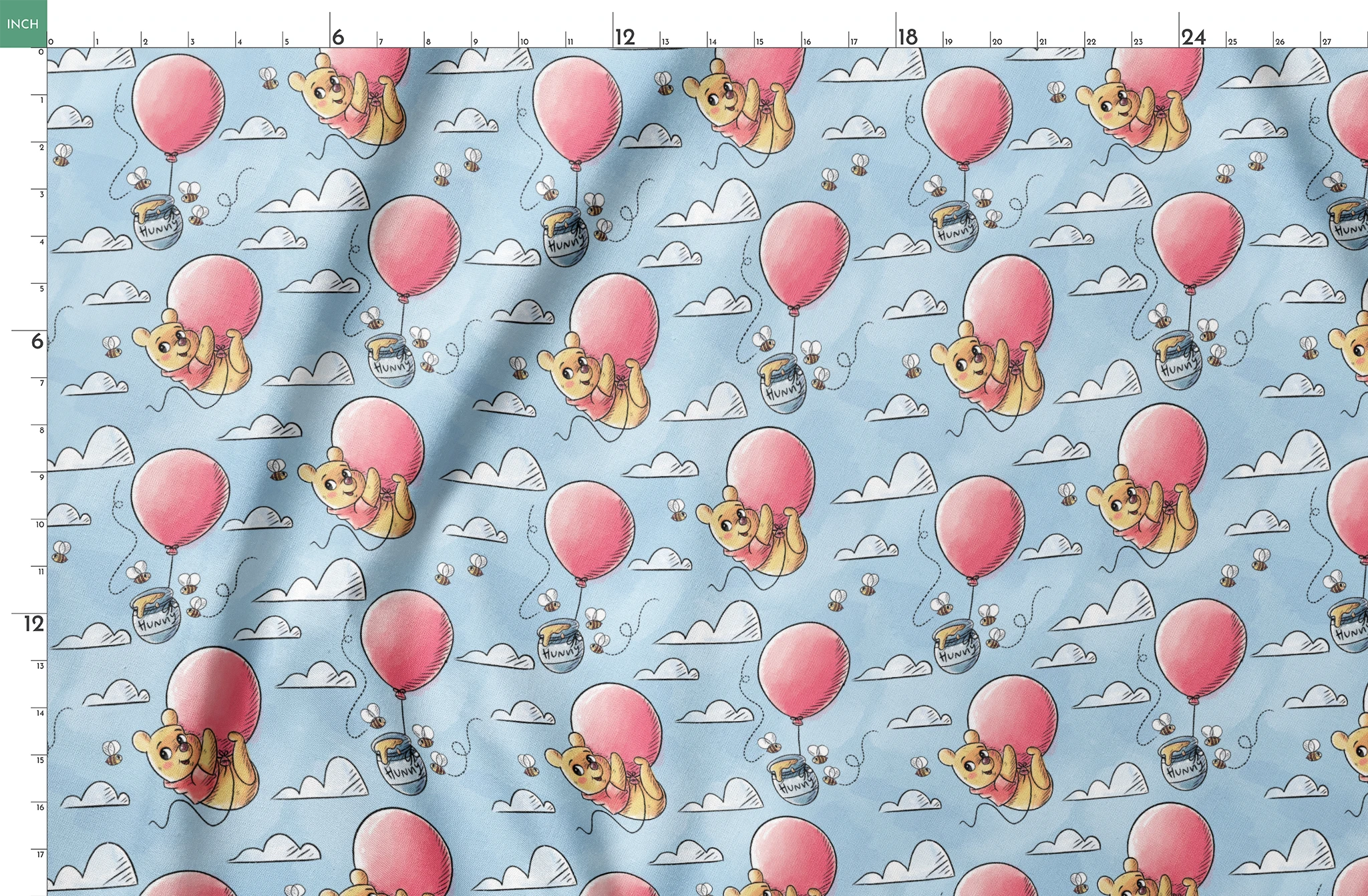Cute yellow bear characters floating with pink balloons and honey pots against a blue sky with cl... springs fatquarter mockup