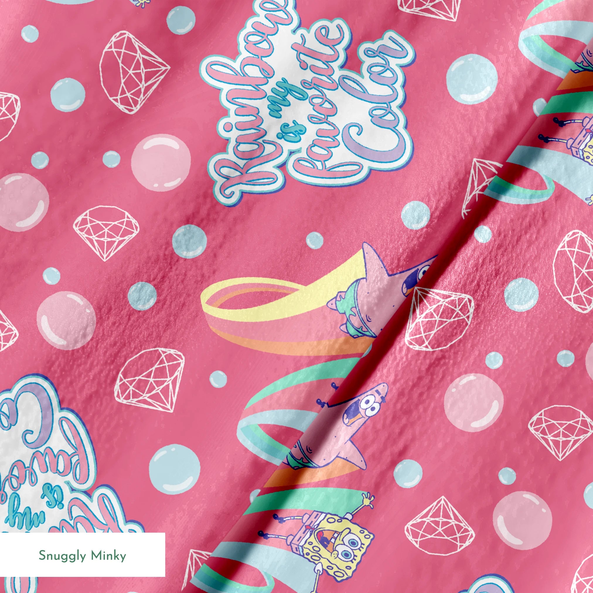 Patrick Star floats among pastel rainbows, bubbles, and gems on a pink background with the phrase “Rainbow is my favorite color” in a SpongeBob design springs minky texture