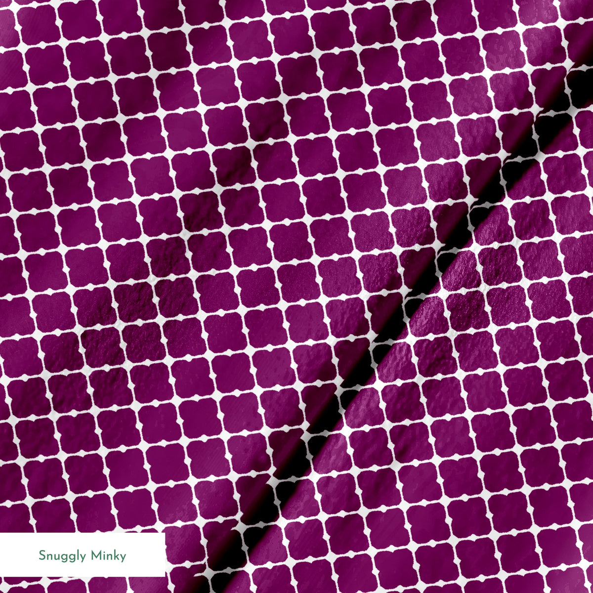 Plum quatrefoil pattern with white lattice outline on deep plum background springs minky texture