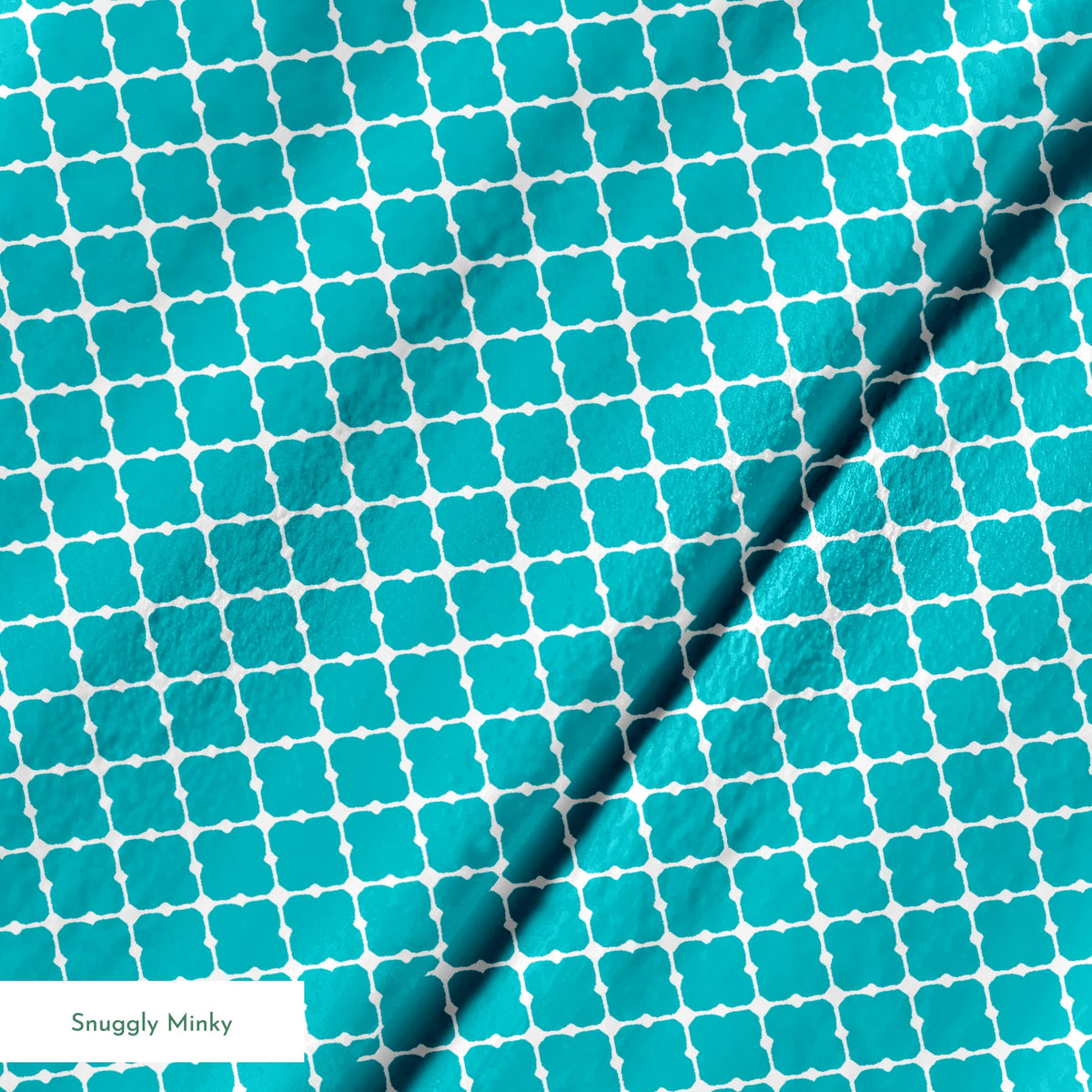 Turquoise and white quatrefoil pattern with Moroccan-inspired geometric design springs minky texture