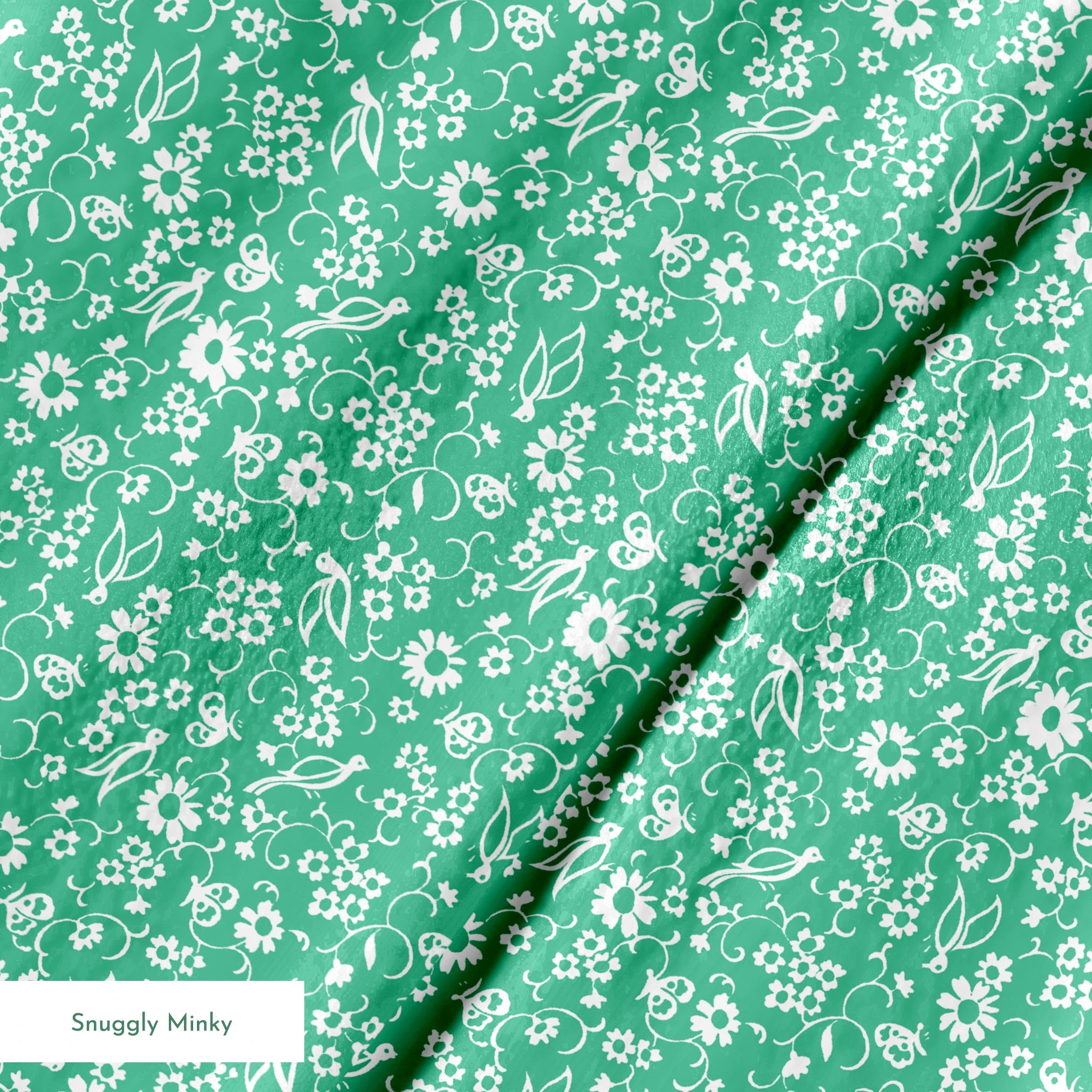 White floral pattern with delicate blooms and leaves on a mint green background springs minky texture