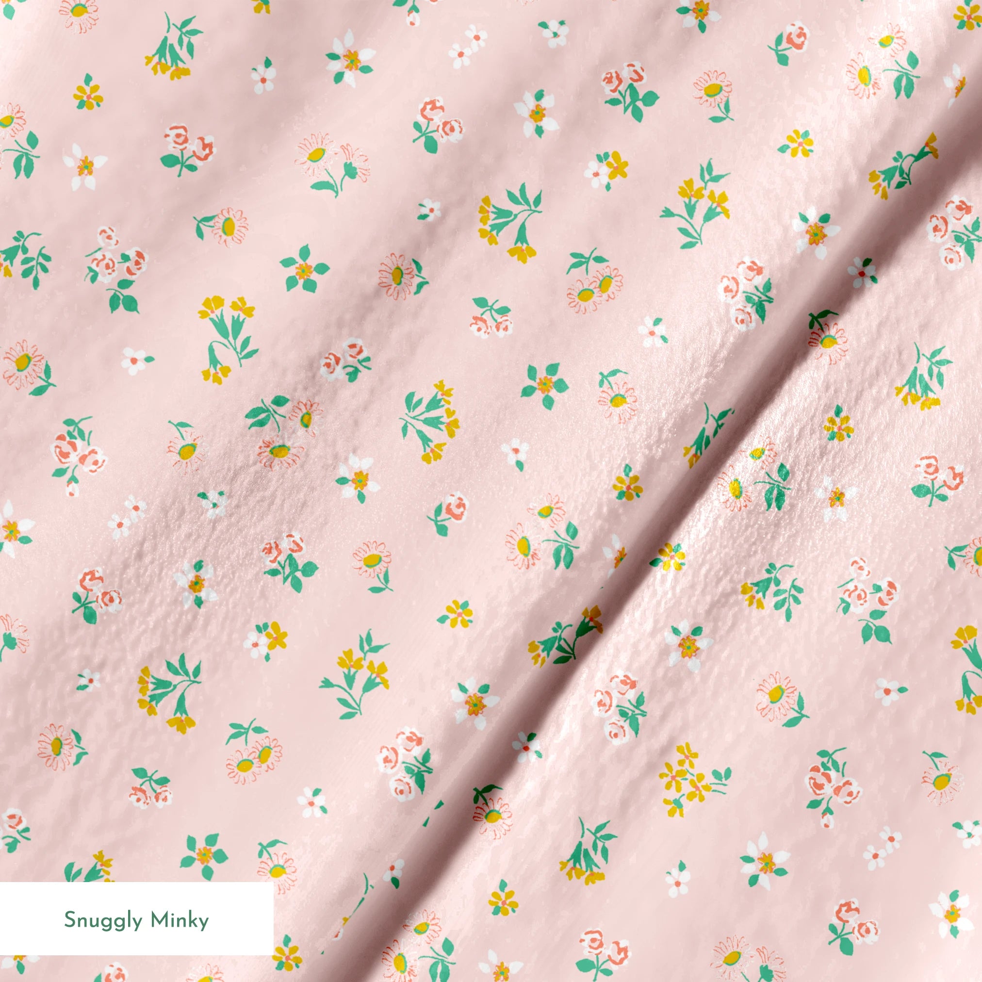 Small floral pattern on pink background with white daisies and yellow, blue, and pink flowers springs minky texture