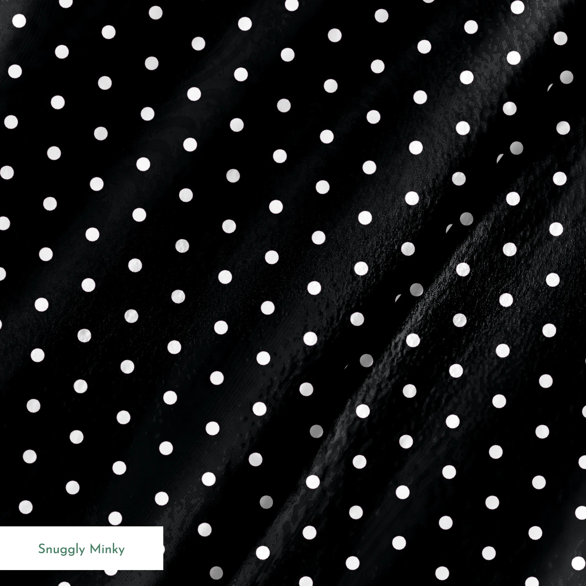 White circular dots on a black background springs minky texture
