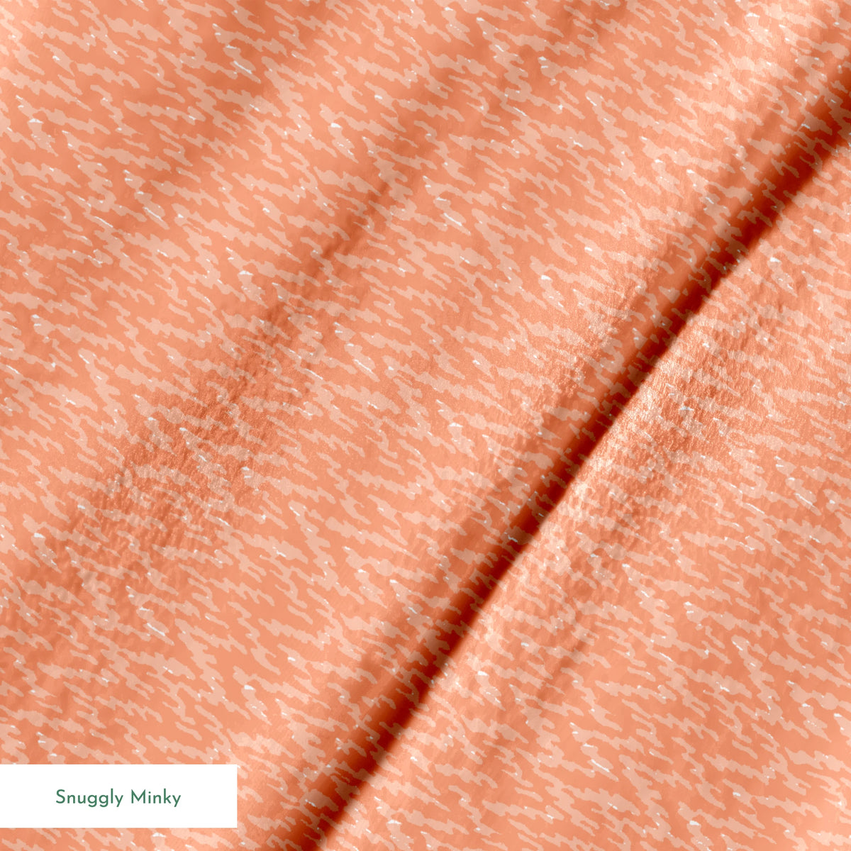 Peachy coral abstract pattern with light brushstroke-like texture and diagonal movement springs minky texture