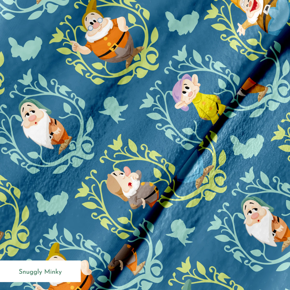 Pattern of cartoon birds in decorative oval frames on blue background with leaf motifs springs minky texture