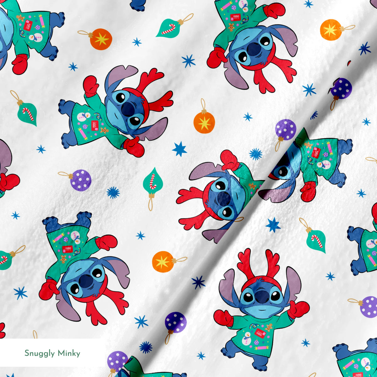 Disney's Stitch wearing green Christmas sweater and red scarf in repeating pattern with ornaments and stars. springs minky texture