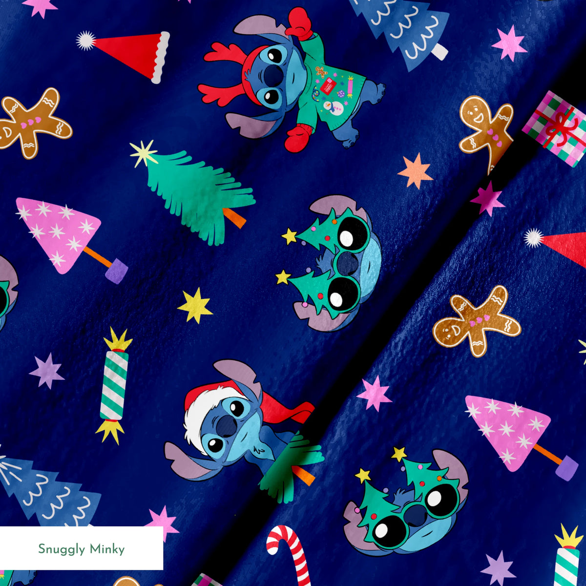 Festive Christmas pattern with Stitch, trees, candy canes, presents, and gingerbread men on navy background springs minky texture