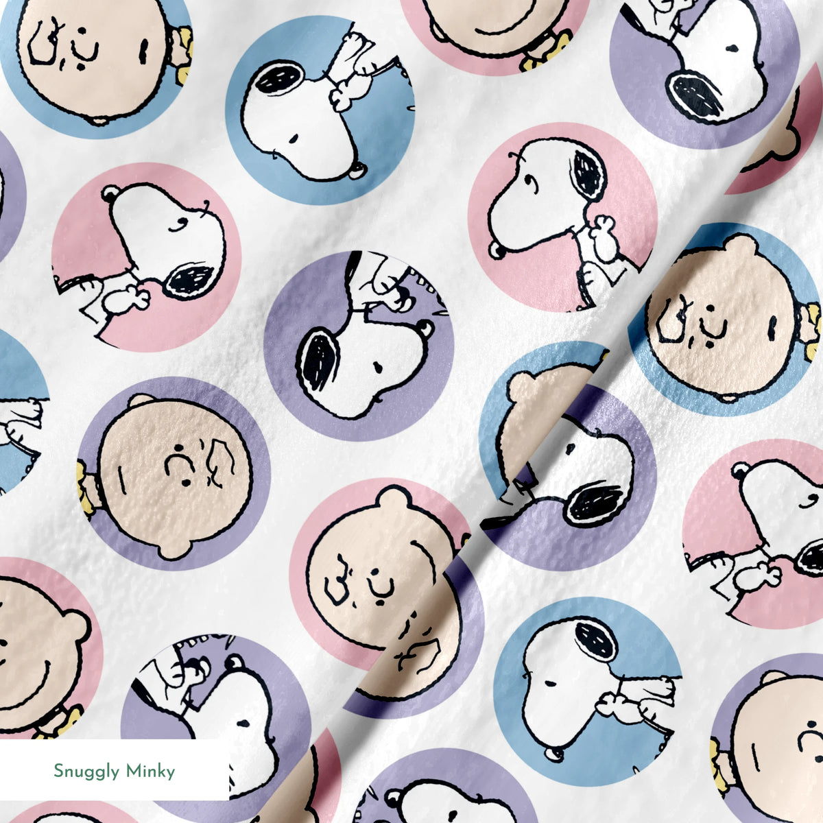Peanuts cartoon pattern with Charlie Brown and Snoopy circular portraits in pink, blue and purple springs minky texture