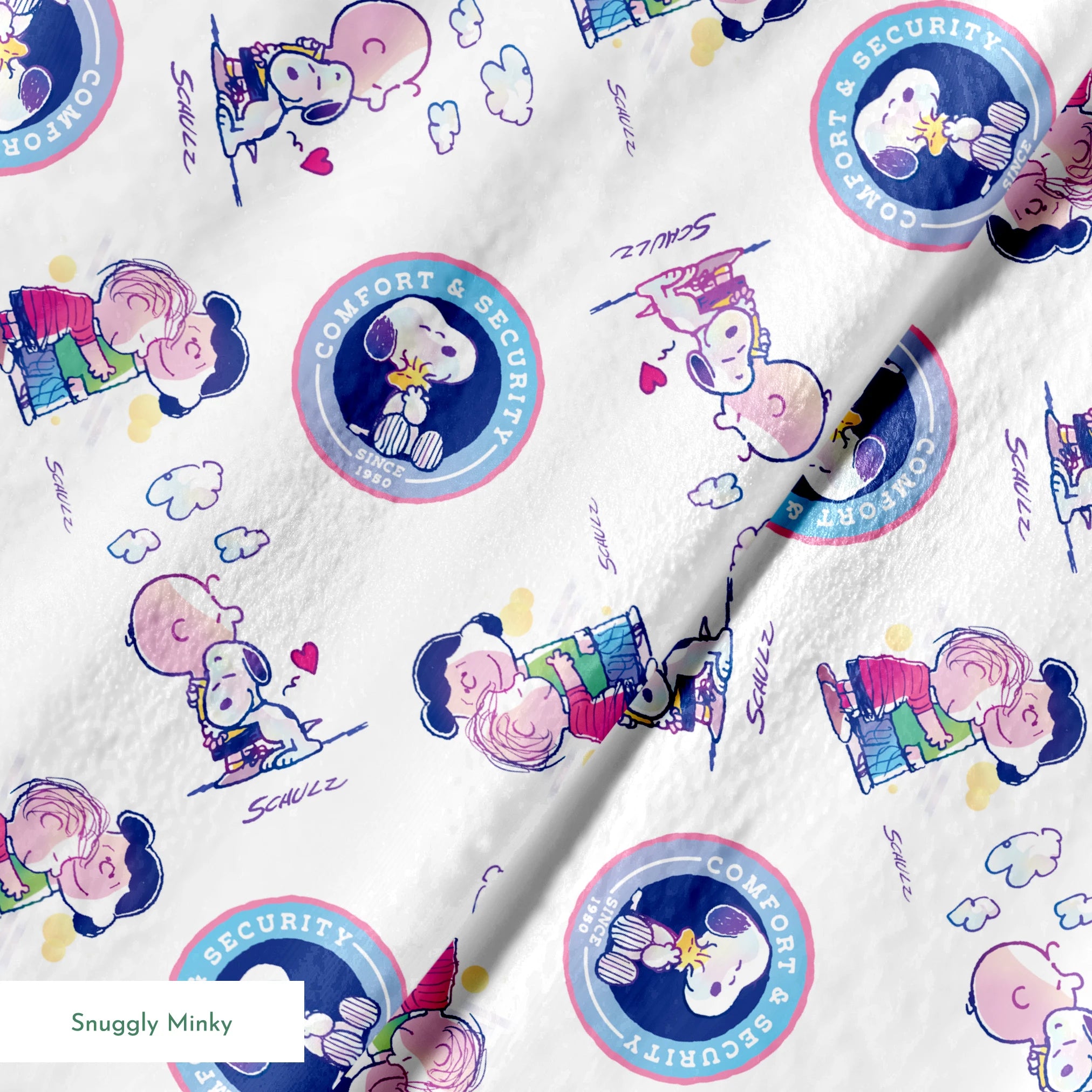 Peanuts cartoon pattern with Snoopy in blue circles and Charlie Brown with books on white background springs minky texture