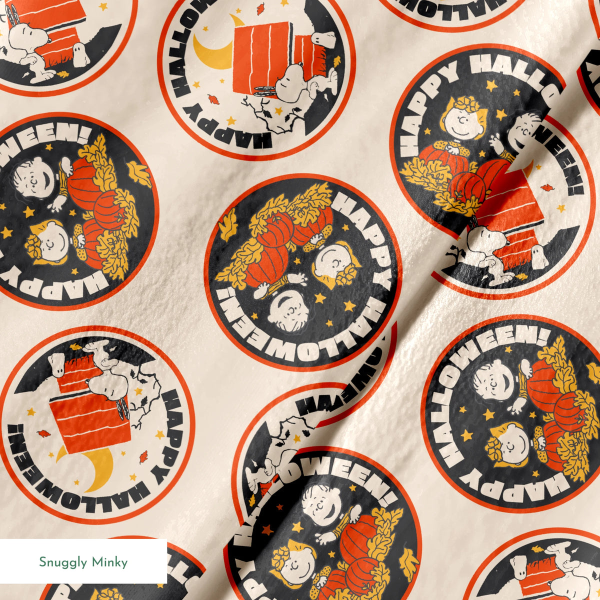 Peanuts Halloween pattern with circular badges featuring characters and "Happy Halloween" text on beige background springs minky texture