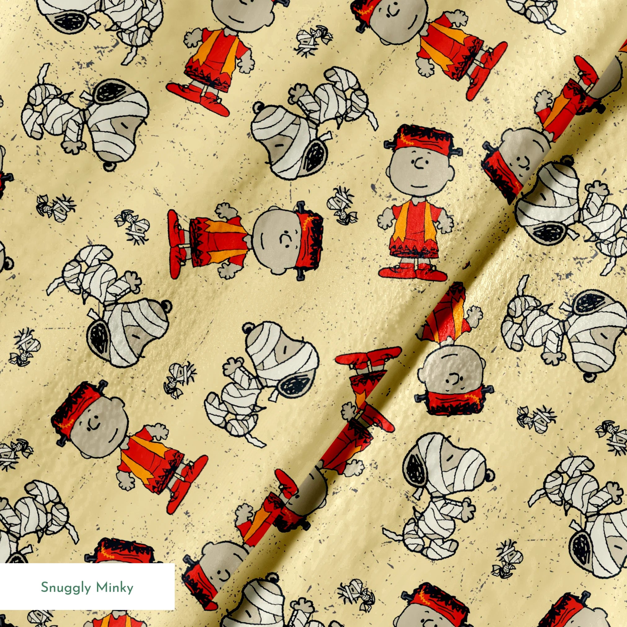 Peanuts characters pattern with Charlie Brown and Snoopy in halloween attire on beige background springs minky texture