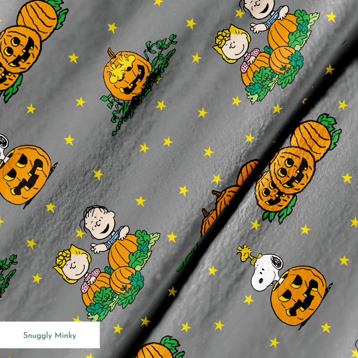 Peanuts Halloween pattern with Snoopy on pumpkins, Peanuts characters in pumpkin patches, and yellow stars on gray background. springs minky texture
