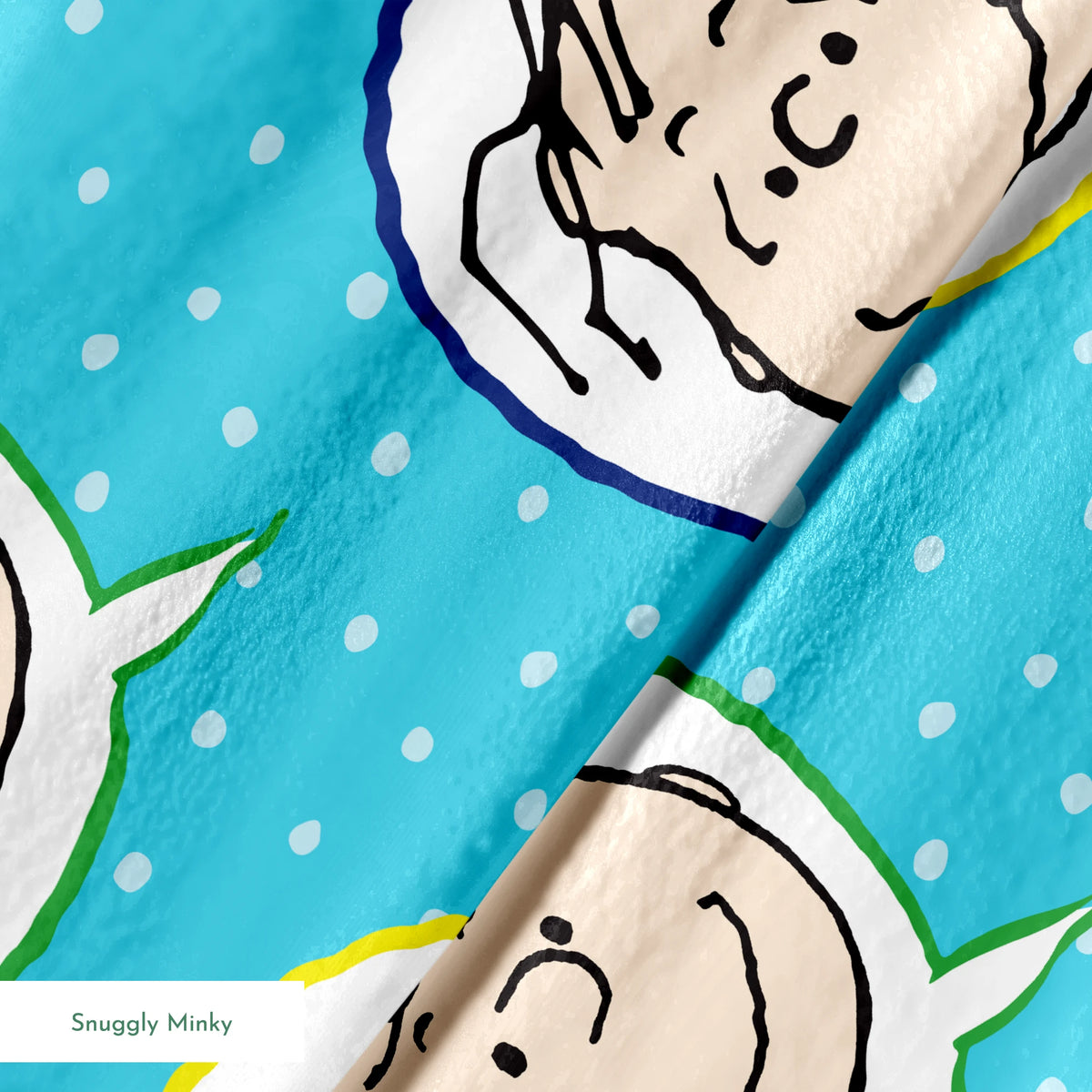 Peanuts characters pattern with Snoopy and other cartoon faces in circles on blue background springs minky texture