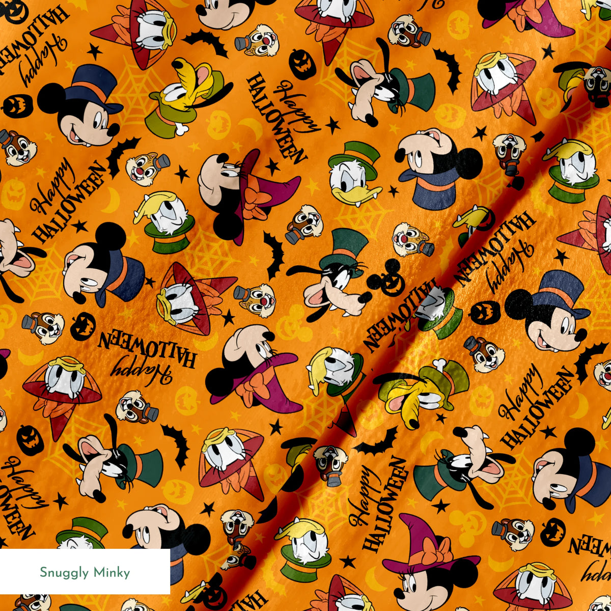 Disney characters in Halloween costumes on orange background with pumpkins and "Happy Halloween" text springs minky texture