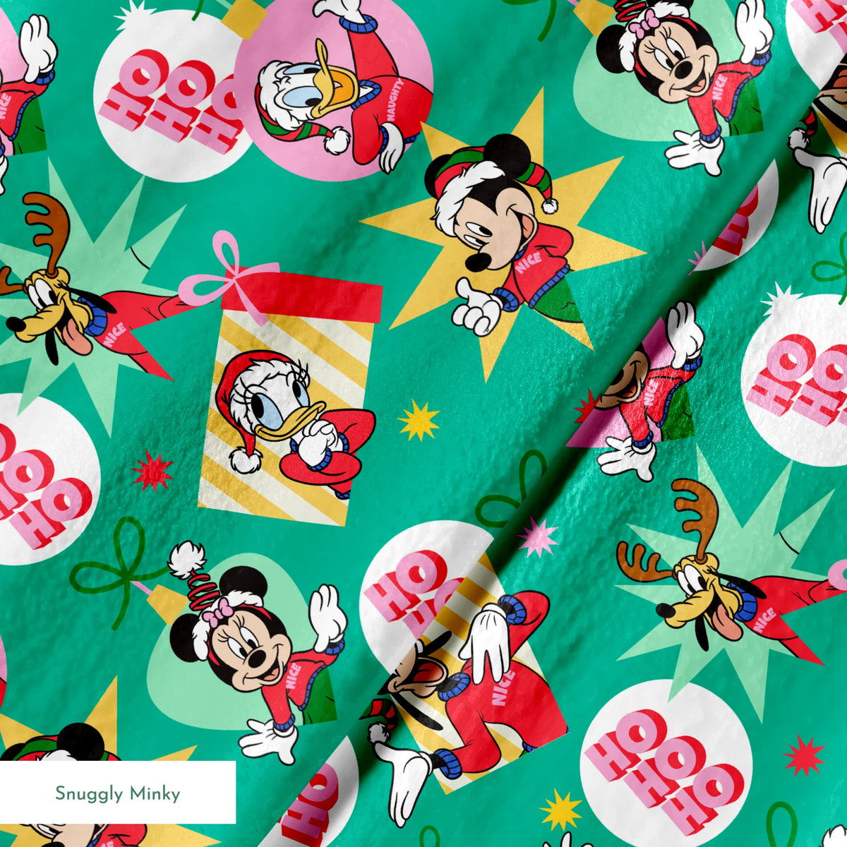 Festive Disney characters on green holiday pattern with "Ho Ho Ho" text and Christmas ornaments springs minky texture