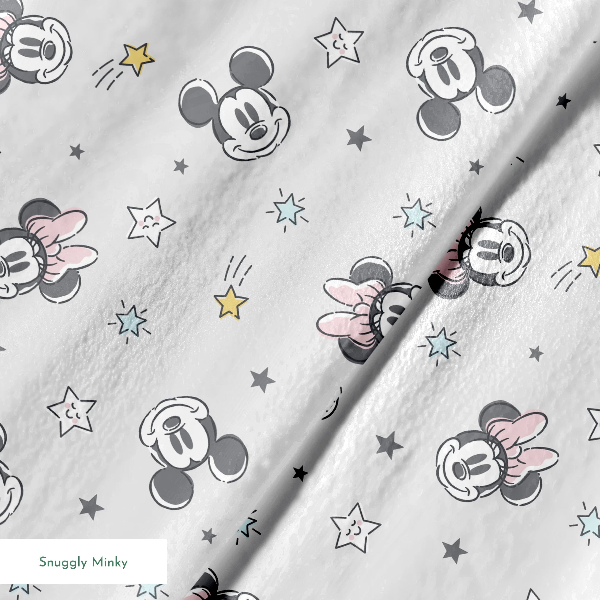 Mickey and Minnie Mouse pattern with stars on light gray background springs minky texture