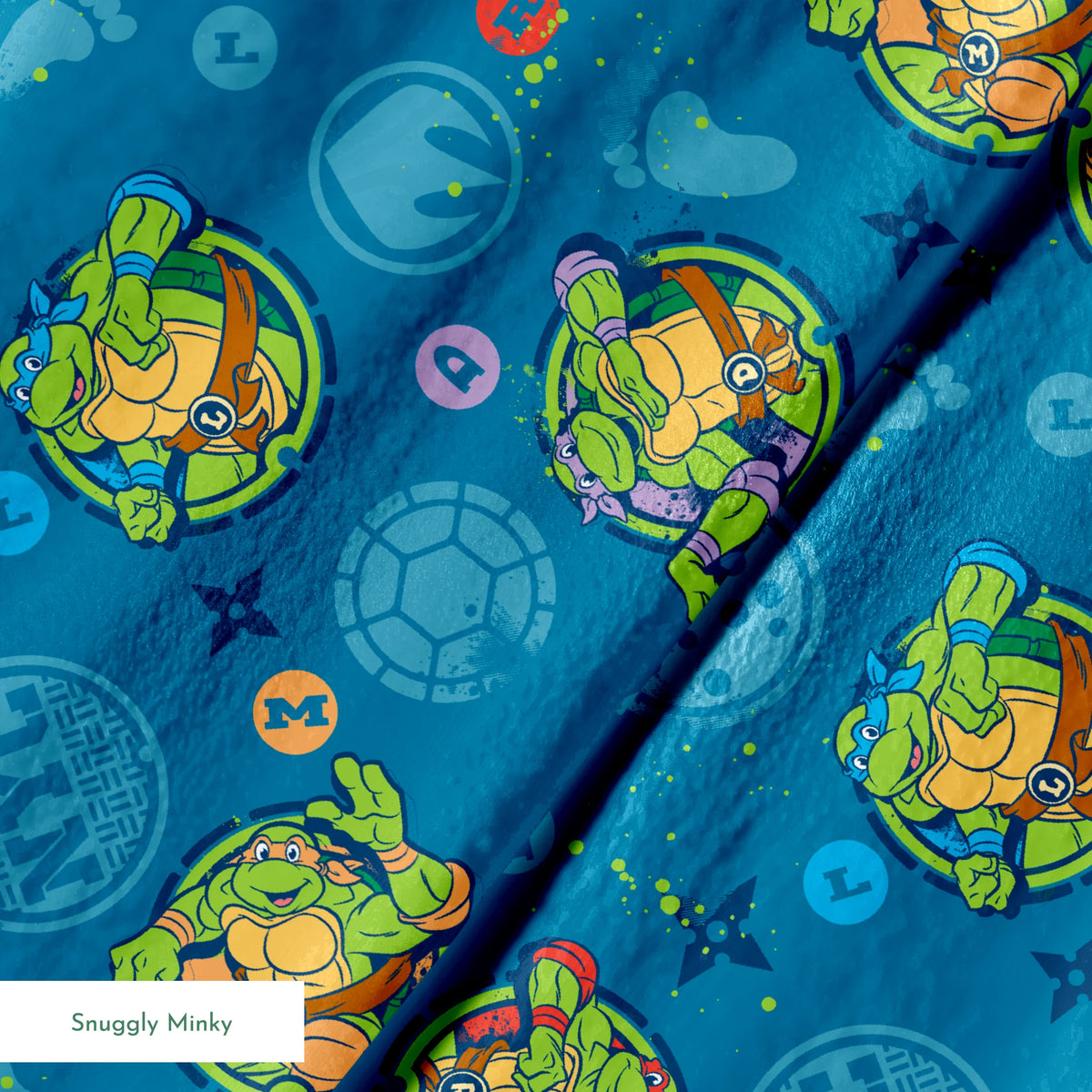 Teenage Mutant Ninja Turtles in circular medallions on teal background with subtle geometric patterns springs minky texture