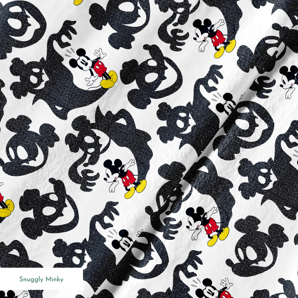 Mickey Mouse pattern with black ghost silhouettes on white background springs minky texture