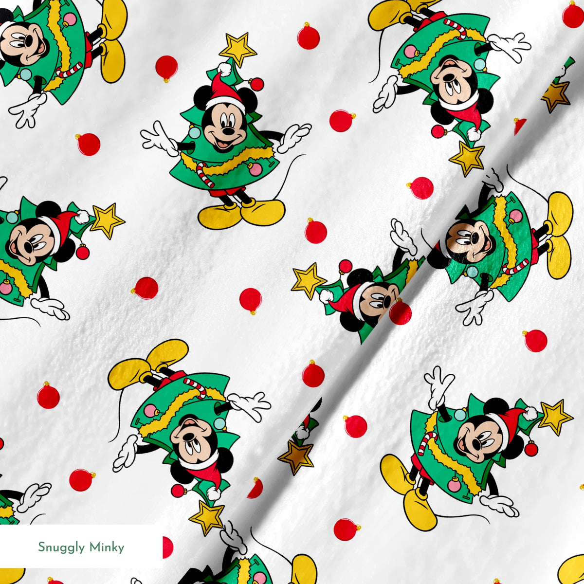 Mickey Mouse in a Christmas tree costume and stars on white background with red dots springs minky texture