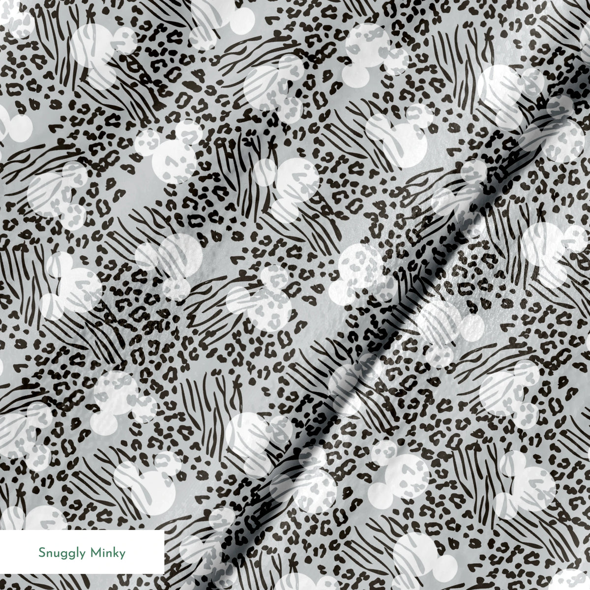 Animal print pattern with zebra stripes and leopard spots in black and white on gray background springs minky texture