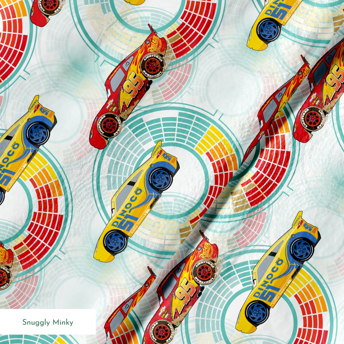 Colorful Disney Pixar Cars racing in red and yellow on a light blue background with circular patterns springs minky texture
