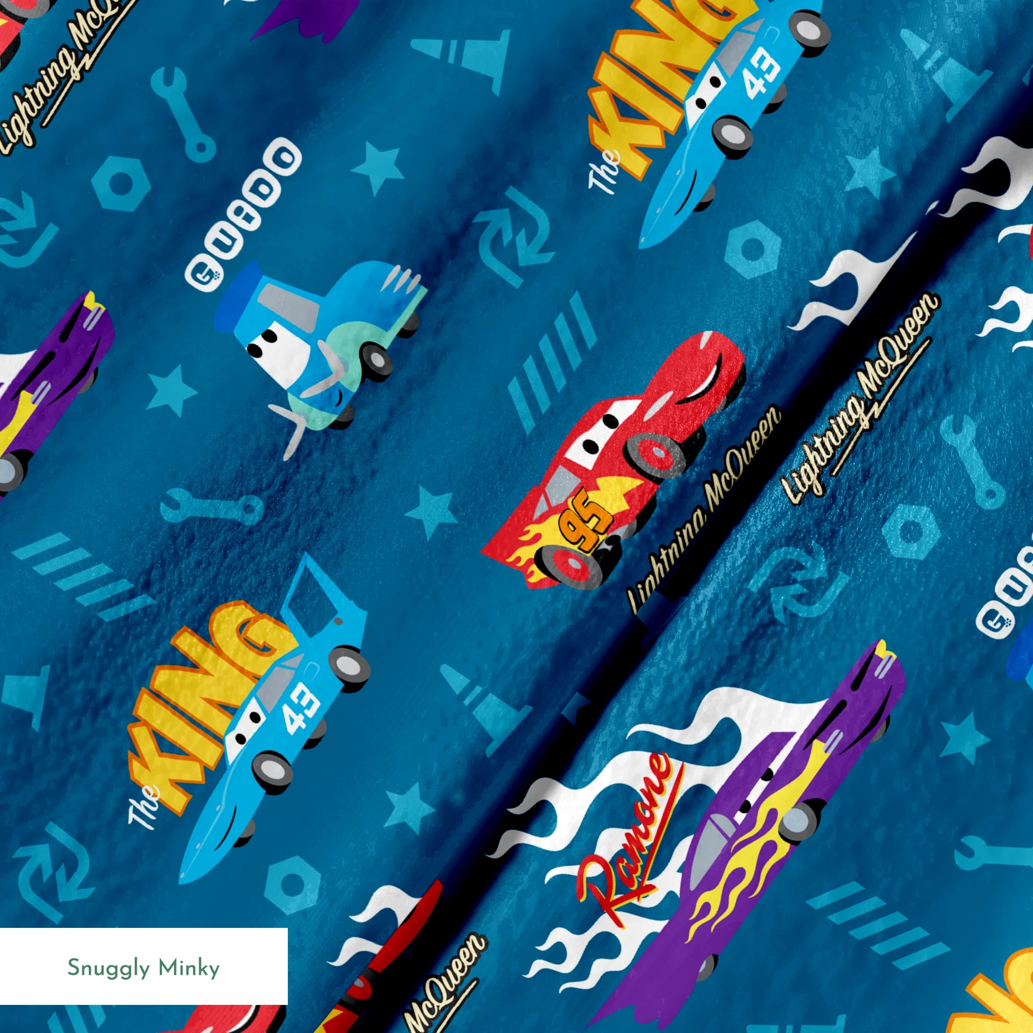 Disney Cars pattern featuring Lightning McQueen, Ramone's purple car with flames, and The King 43 on blue background with racing icons springs minky texture
