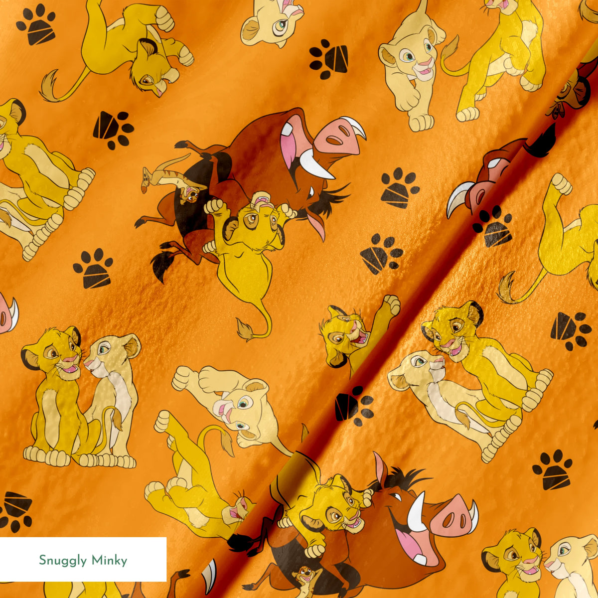 Playful pattern of cartoon cubs in yellow and brown poses on bright orange background with pawprints springs minky texture