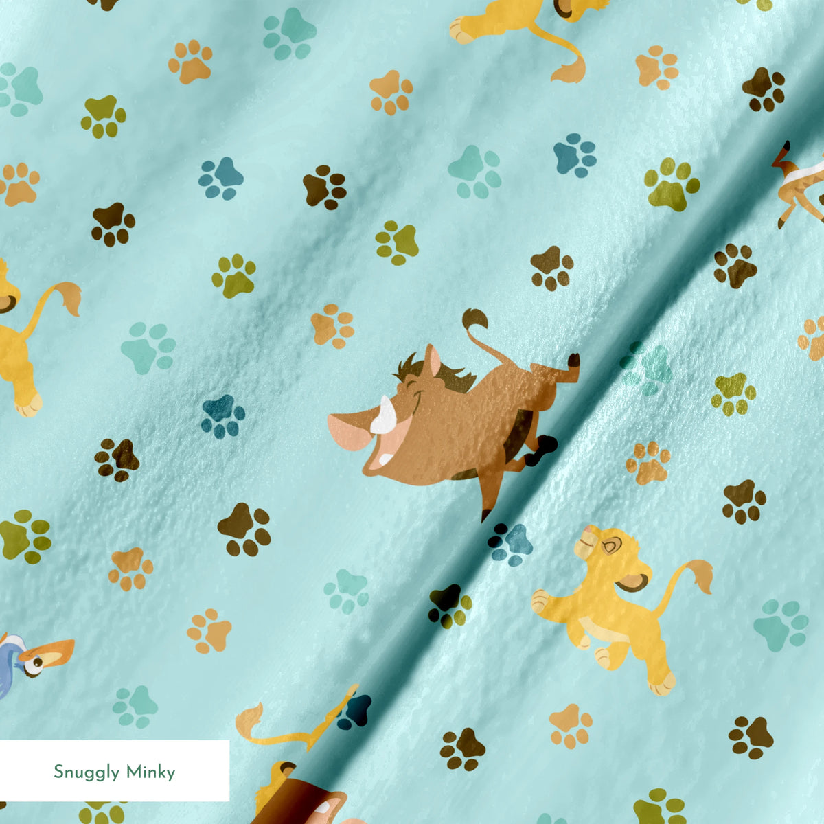 The Lion King pattern with paw prints on light blue background springs minky texture