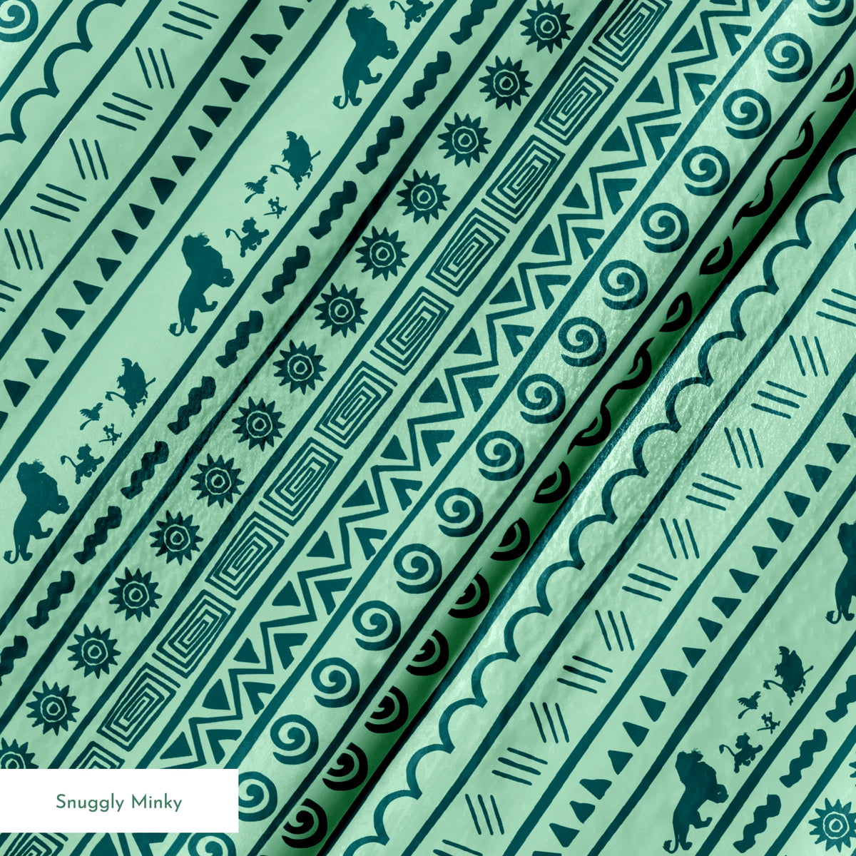 Traditional African-inspired pattern in dark teal on mint green with lions, spirals, triangles, and geometric motifs springs minky texture