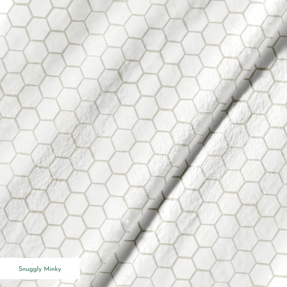White and beige honeycomb pattern fabric designed by Nicole Tamarin with a subtle, modern farmhouse style. springs minky texture