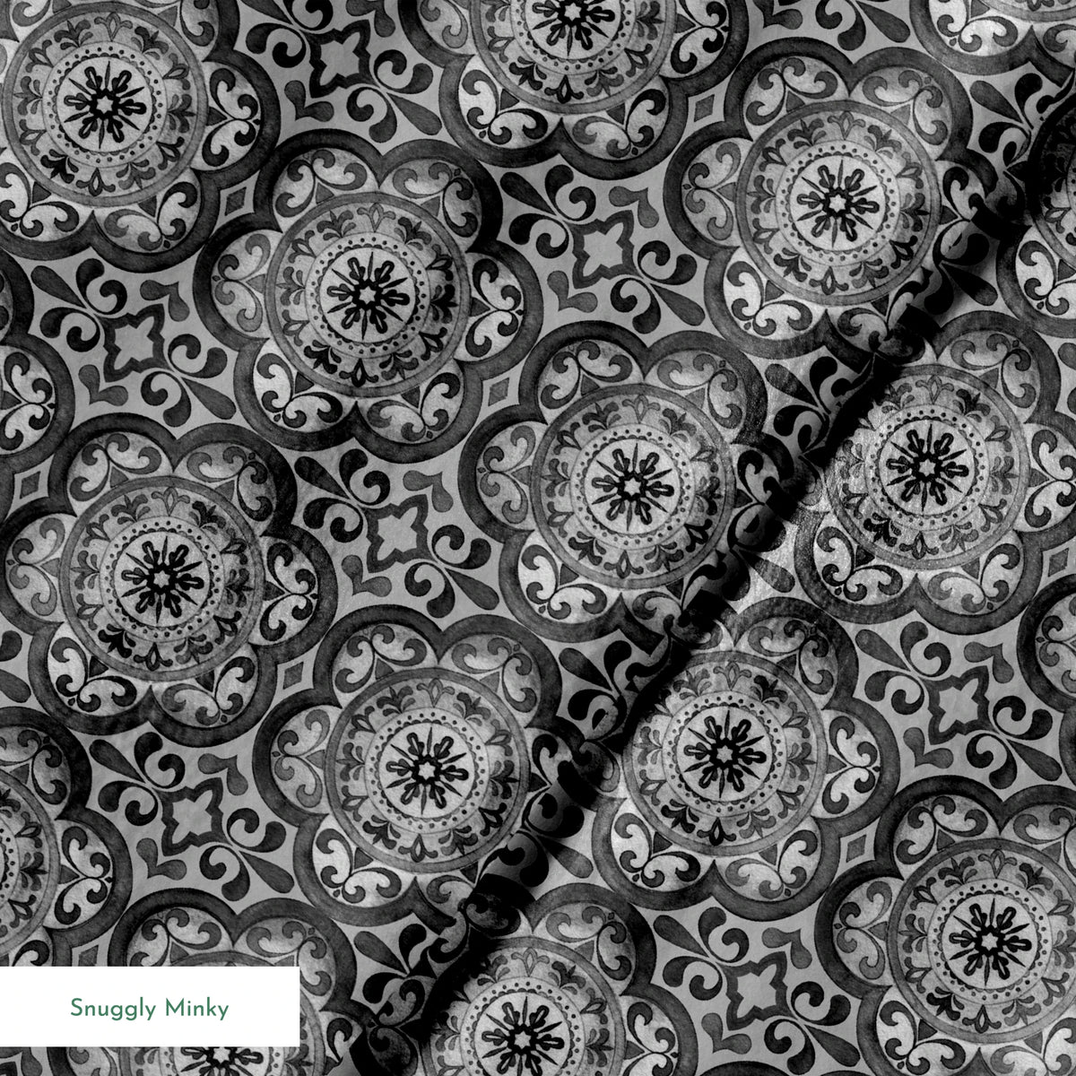 Grayscale medallion tile pattern with floral and scroll motifs in a symmetrical layout by Nicole Tamarin. springs minky texture