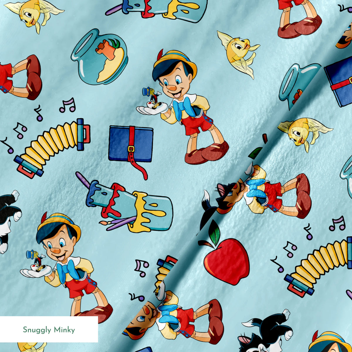 Cartoon pattern with wooden puppets, red apples, musical notes, goldfish bowls, cats, and books on light blue background springs minky texture