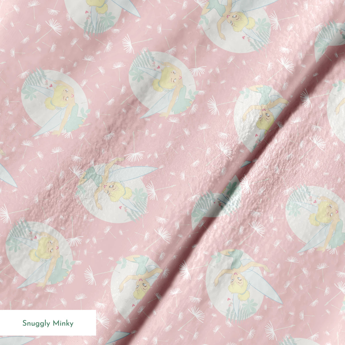 Pink background with dandelion seed pattern featuring Tinker Bell in mint green circles, whimsical Disney design springs minky texture