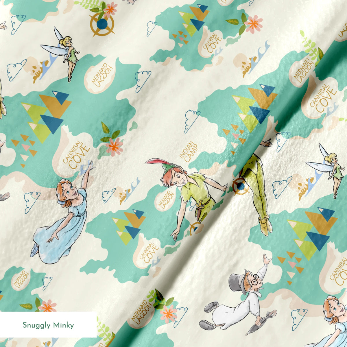 This is a whimsical Peter Pan themed pattern featuring characters flying through a turquoise sky with geometric mountains and text bubbles showing "Mermaid Cove" locations. springs minky texture