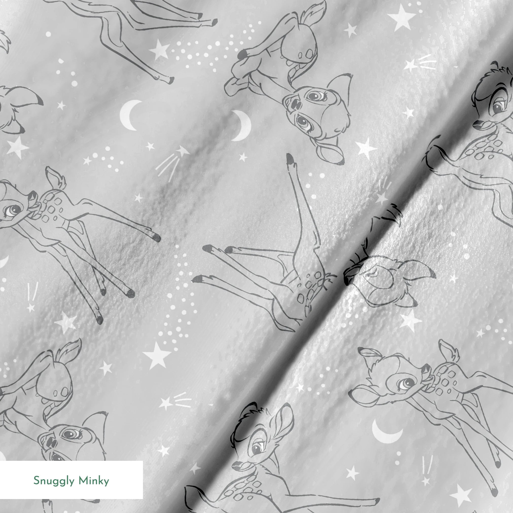 Line art illustrations of Disney’s Bambi surrounded by stars, moons, and stardust trails on a soft gray background in a scattered repeat. springs minky texture